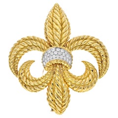 David Webb Broche Fleur-de-lis en or jaune 18 carats et diamants