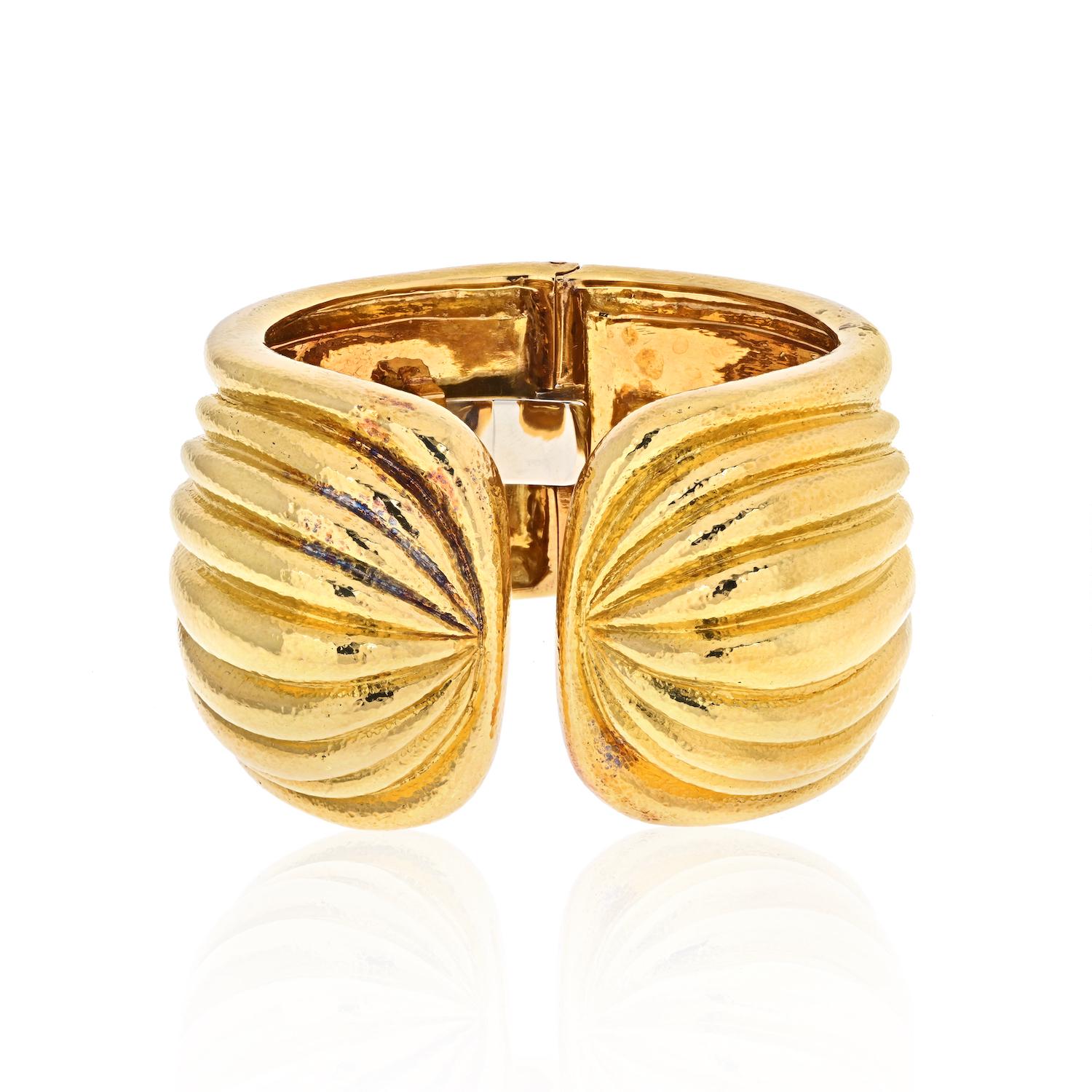 New York's 57th Street is where fashion and culture meet, and where David Webb had his boutique for many years. This is jewelry for sophisticates: urbane, stylish.

The Fluted cuff bangle from the 57th Street collection by David Webb is sure to
