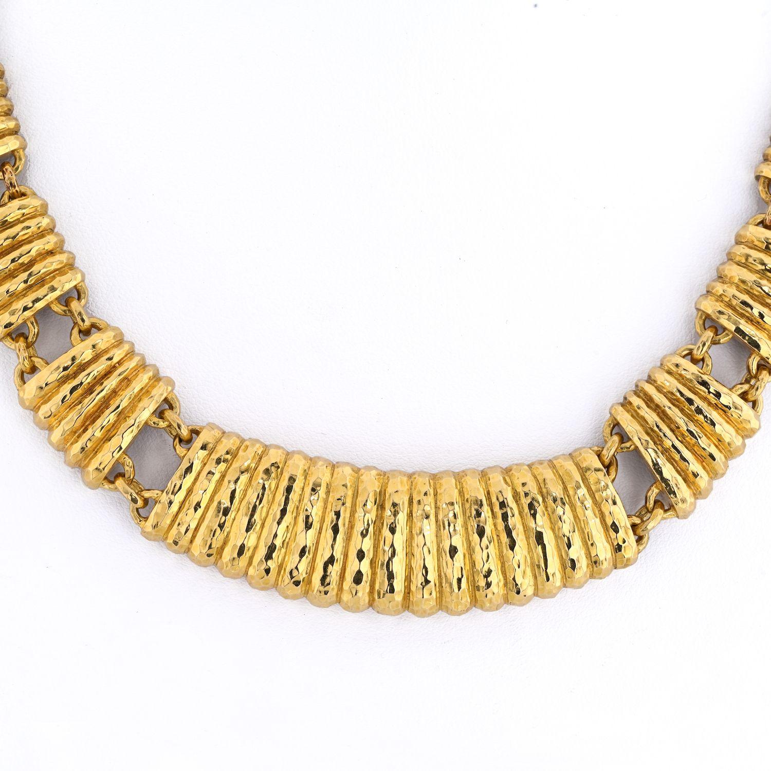 David Webb 18K yellow gold fluted panel link necklace. Crafted in 1970's this is a true vintage gem. Perfect for every day wear or on your special night out. The hammered finish gives this necklace a perfect shimmer, with a soft glow to the entire
