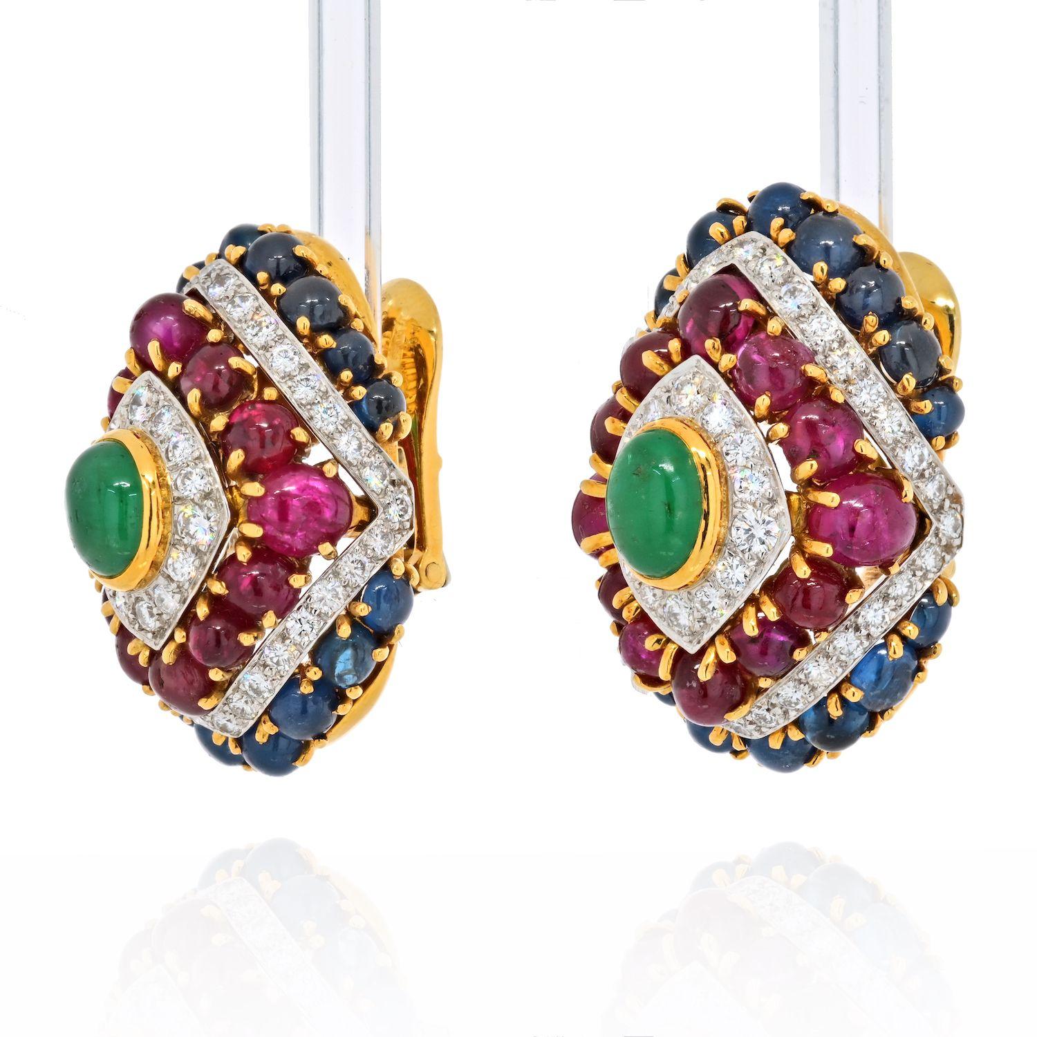 These are extraordinary earrings by David Webb mounted with color stones like rubies, sapphires and emeralds and further accented with diamonds. You cannot not see these earrings when the wearer has them on. They are absolutely spectacular!
The