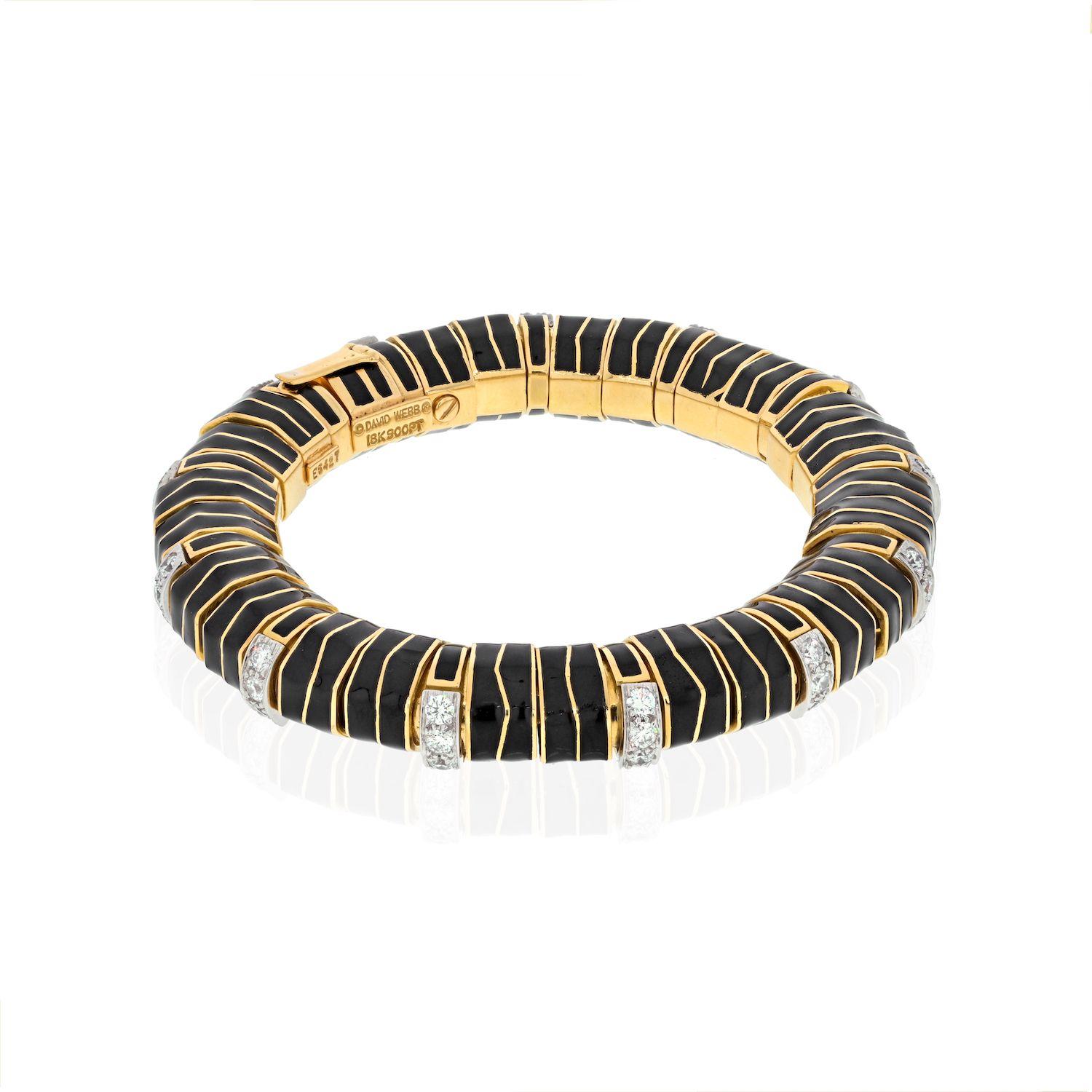 Gently flexible black enamel and diamond bangle by David Webb. Brilliant white diamonds pop from their styled golden links against a dramatic backdrop of black enamel. The piece is gently flexible on the wrist, yet maintains its circular form.