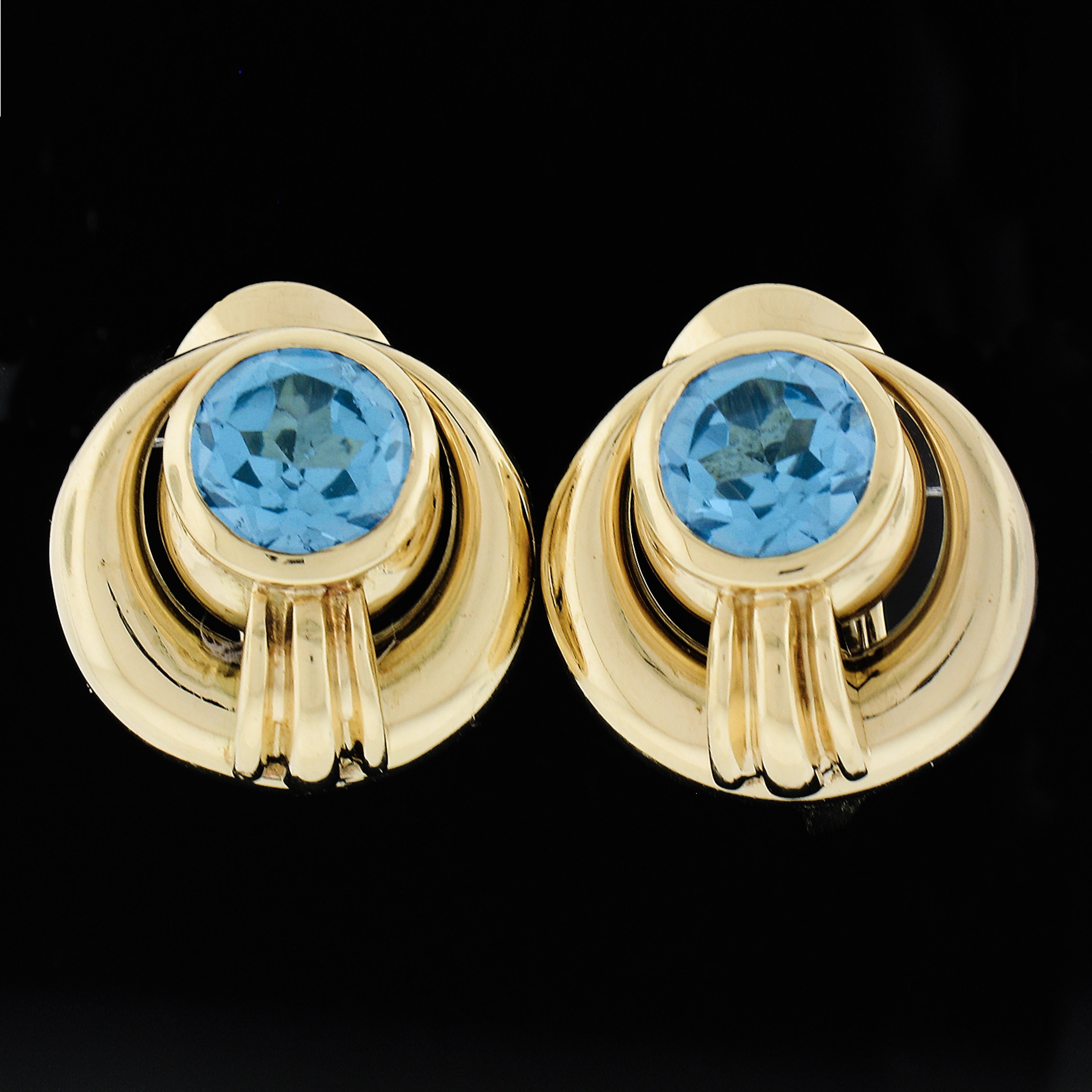 --Stone(s):--
(2) Synthetic Lab Grown Spinel - Round Brilliant Cut - Bezel Set - Vivid Blue Color
** See Certification Details Below for Complete Info **

Material: Solid 18k Yellow Gold w/ White Gold Accents
Weight: 20.26 Grams
Backing: Posts w/