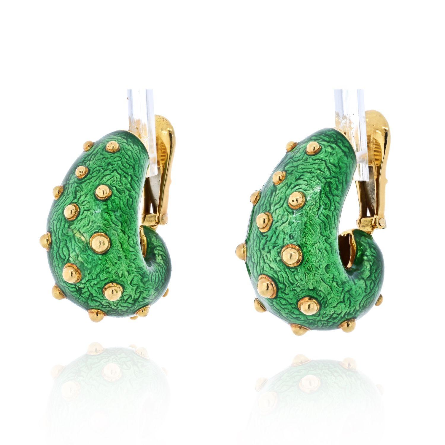 Excellent earrings who is in love with David Webb, enameling and color green. These are fun every day earrings that were handpainted with green enamel, applied with gold round beads on the surface, and secured with clip closure. 
These earrings