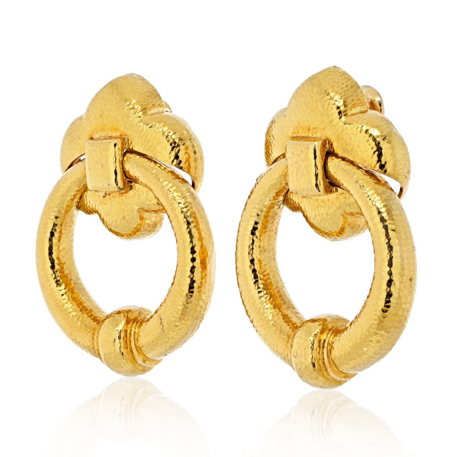David Webb doorknocker earrings with an impressive hoop. 52mm long these earrings are meant to be worn and seen. A true David Webb lover will absolutely appriciate it and wear them daily. Bold as always with Webb, no diamonds to keep it casual,