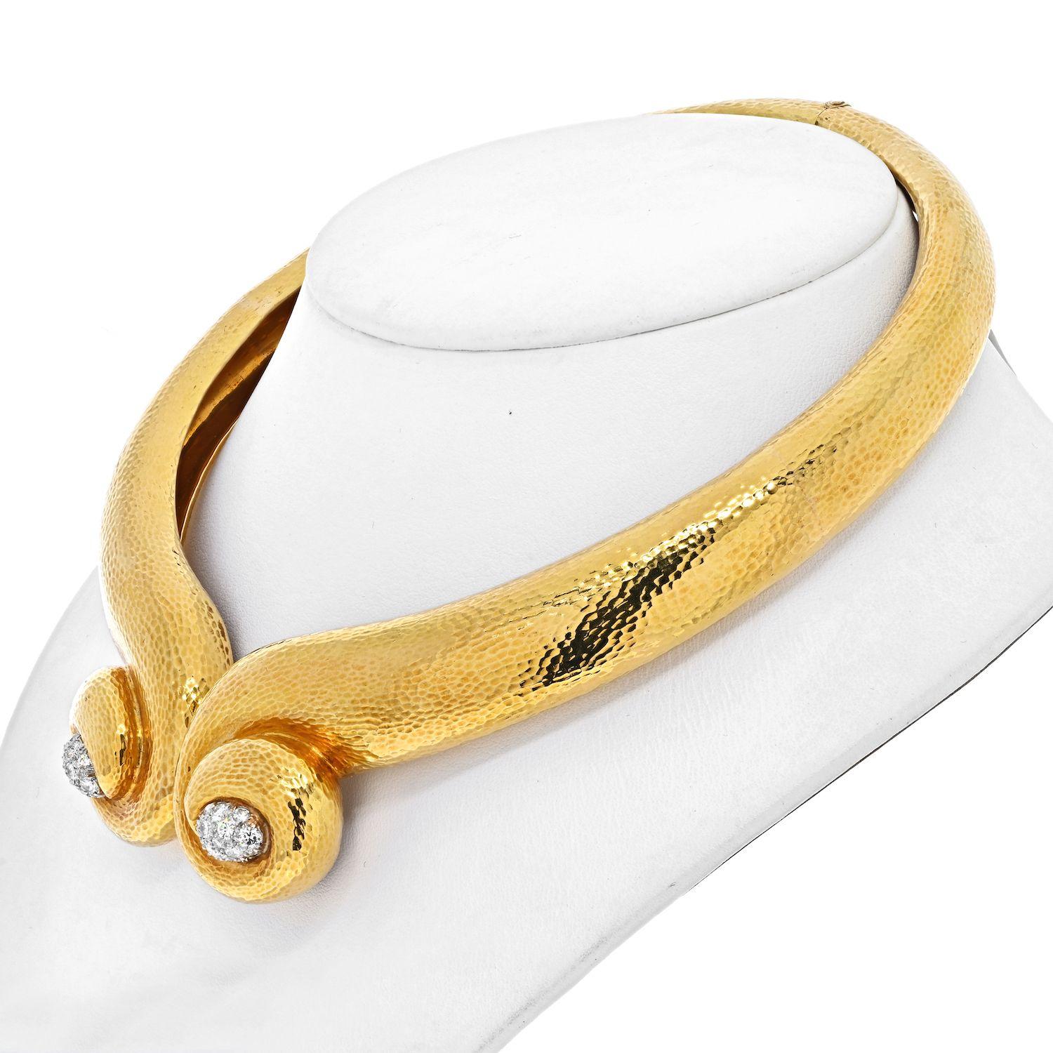 Put a modern twist on your wardrobe rotation with this 18K gold sculpted collar design. This is certainly a choker to remember! 

David Webb collar necklace adds a pop of color and excitement to a white shirt or suit for the day and to a strapless