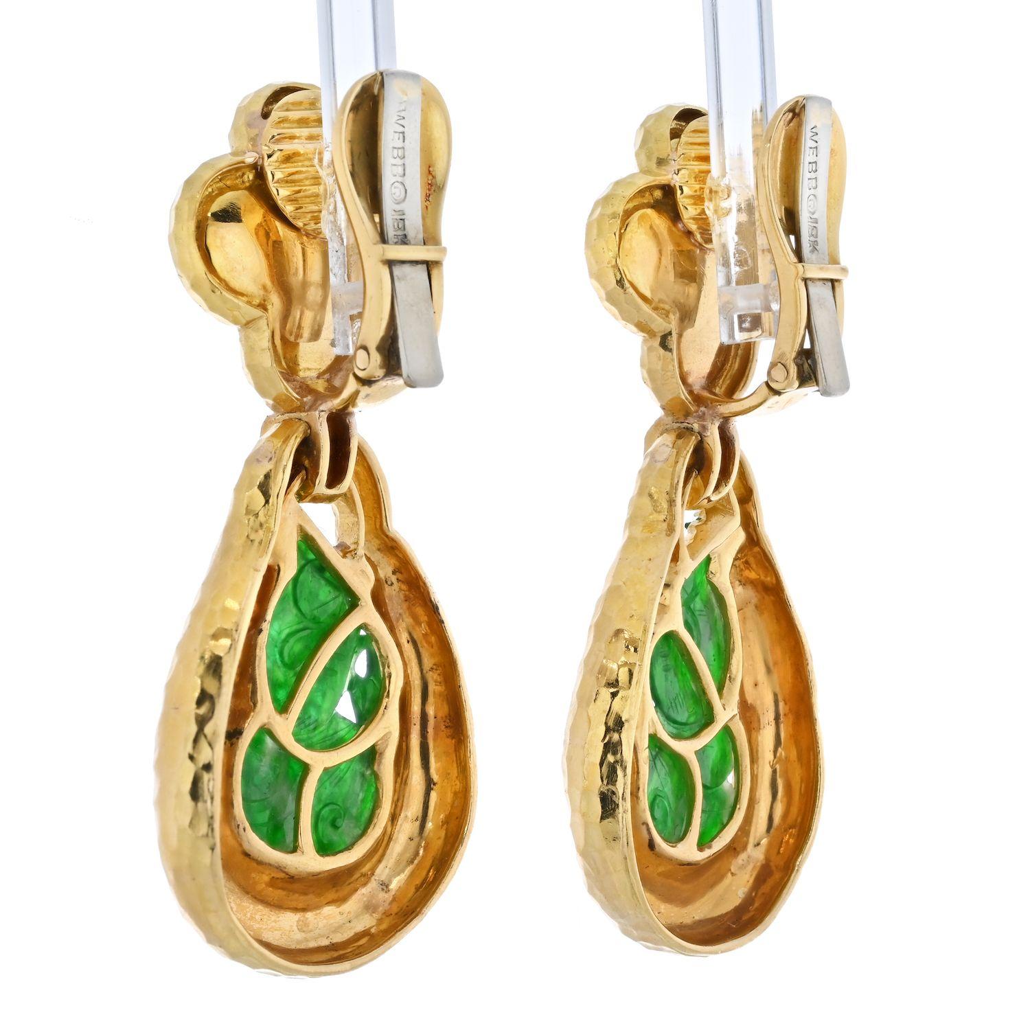 These are easy to wear clip on drop earrings by David Webb. Made with natural jade in pure 18k yellow gold you will love how impressive these earrings look. Normally David Webb earrings are large and bold, these earrings are just as bold but are not