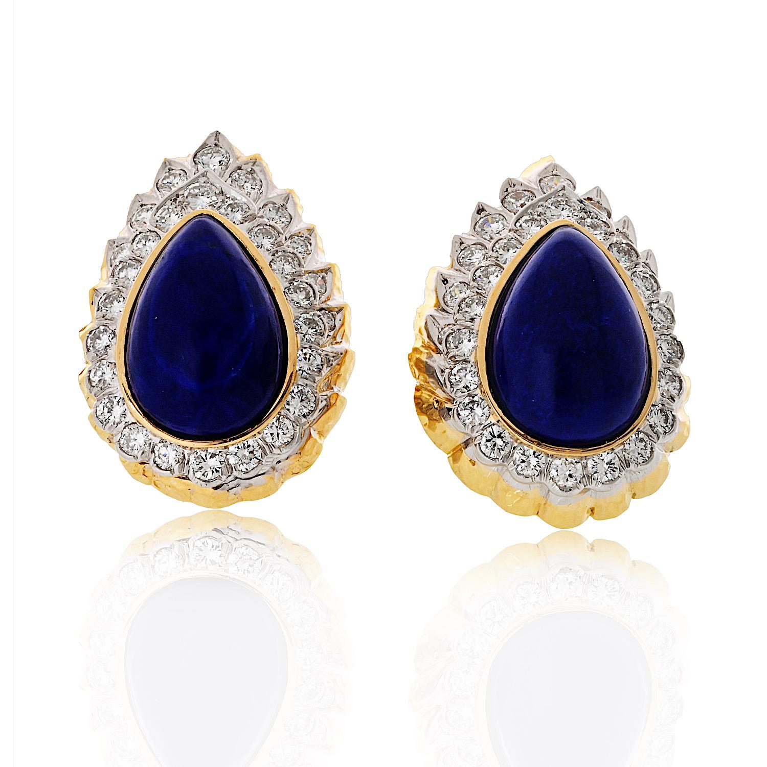 These sophisticated David Webb clip-on earrings feature rich cabochon lapis lazuli stones, accented by brilliant diamonds, all set in luxurious 18k yellow gold and platinum. 

The contrast between the deep blue of the lapis and the sparkle of the