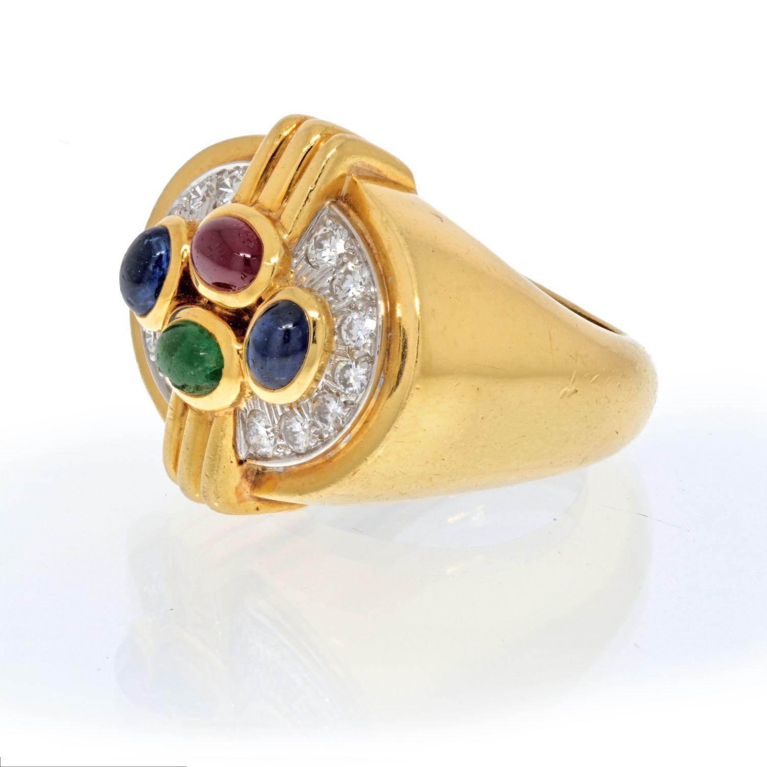 Bright and exciting this David Webb Multi Color Gemstone And Diamond Ring is in great condition and comes as a part of a ring and earrings set. Mounted with cabochon rubies, sapphires and an emerald, paved with round cut diamonds.
Width accorss