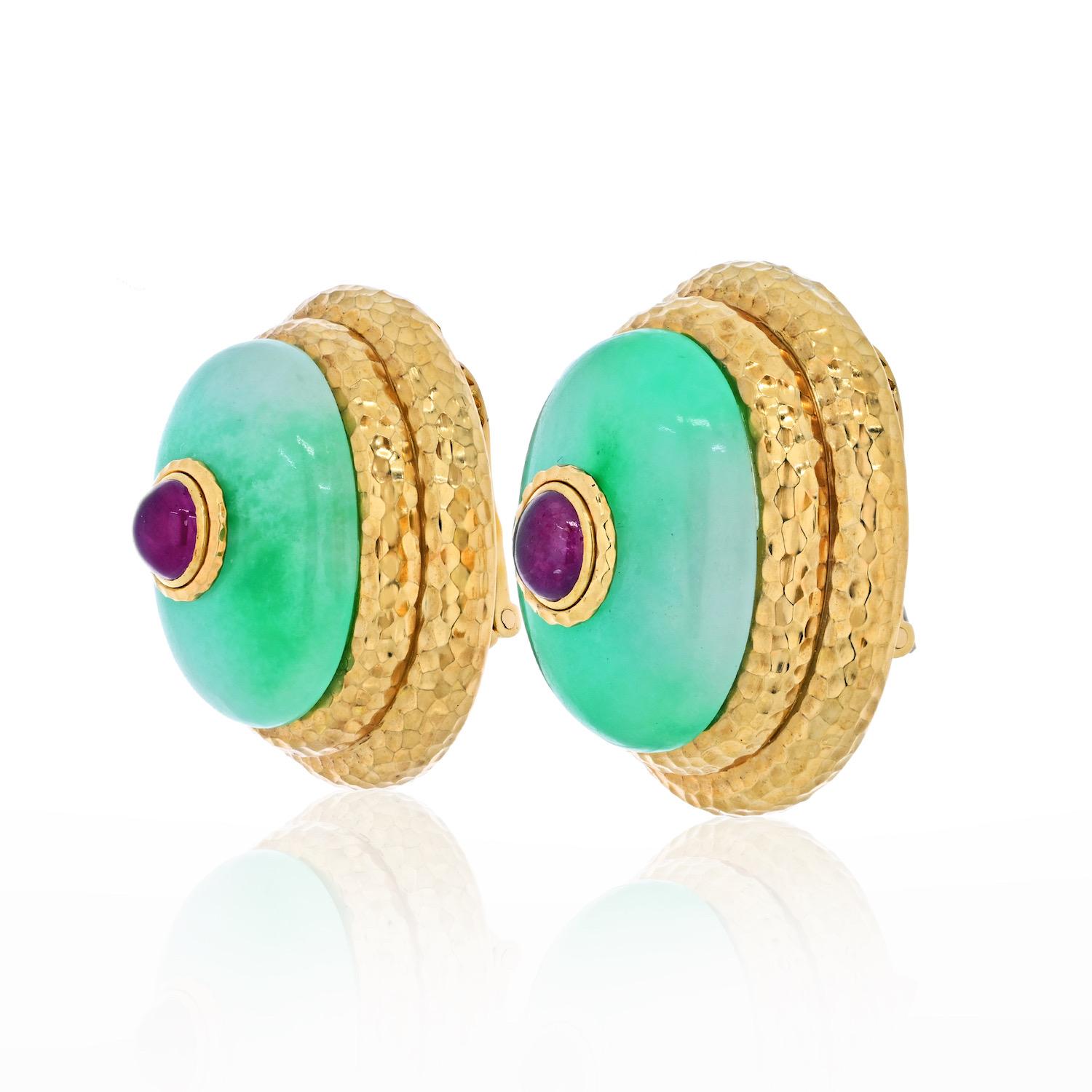 Absolutely spectacular these oversized jade earrings will make all heads turn they are that gorgeous!
We love the apple color green and the dome surface of the clip. Each earring is accented with a cabochon ruby in the center and enclosed in a