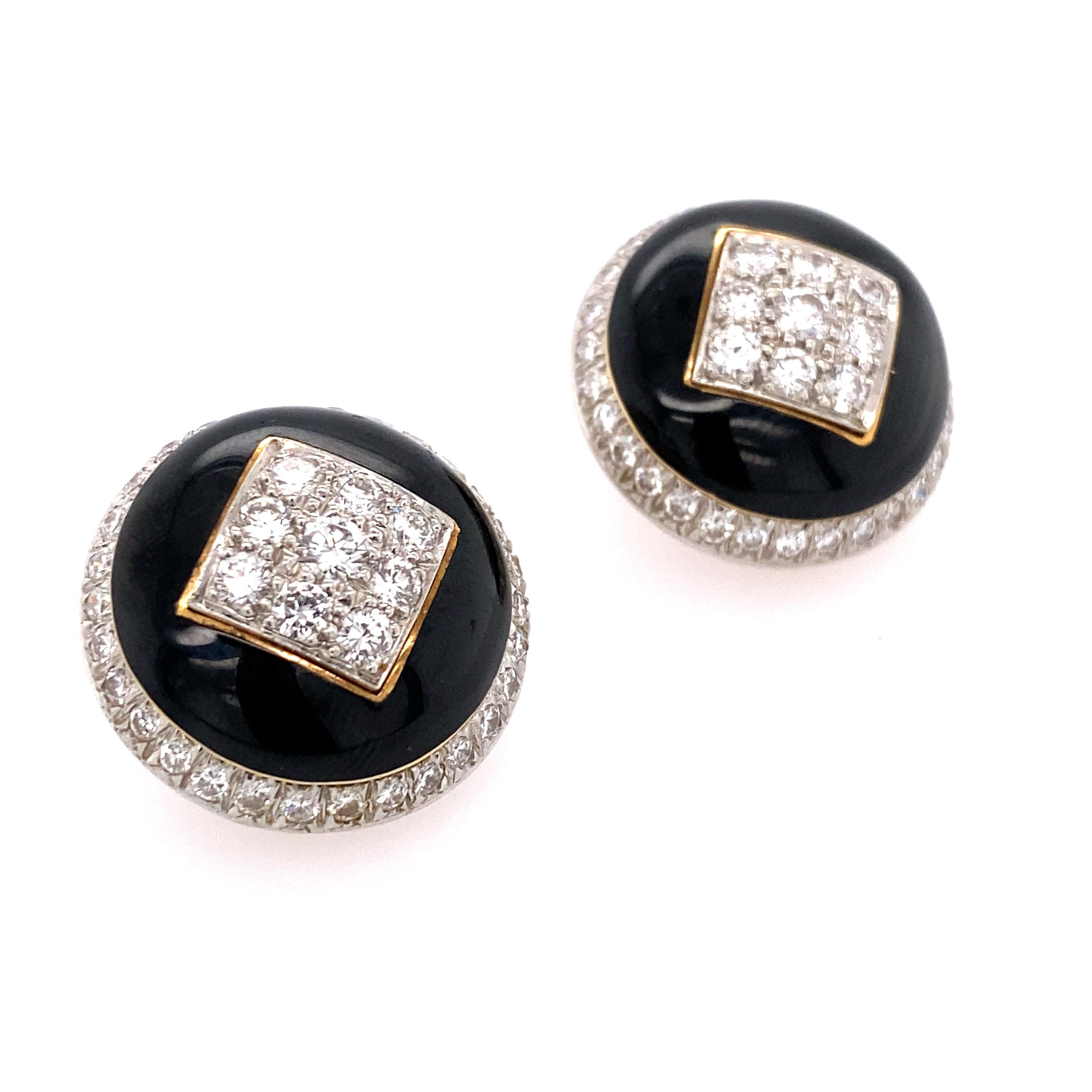 David Webb 18k Yellow Gold, Platinum and Black Enamel Diamond Earrings 
Approx. 3.50 cts of diamonds. 
Earrings Diameter 19 mm 