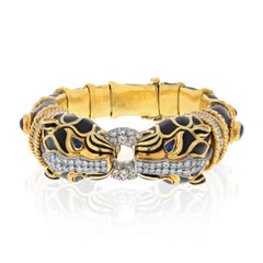 David Webb 18K Yellow Gold, Platinum Double Lion Black Enamel Sapphire Bracelet