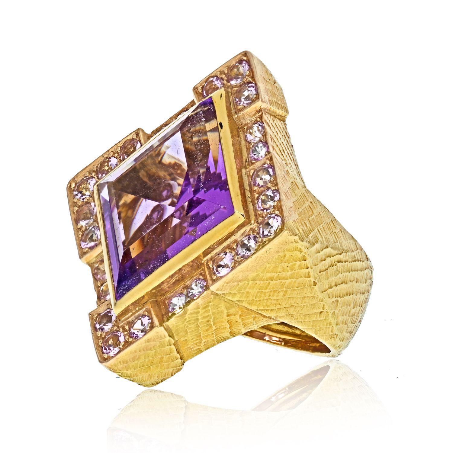 David Webb 18K yellow gold Purple Amethyst ring. Feels substantial and heavy on the finger. 
Stunning statement that works day to night. 
Top length: 34mm 
ztop width: 30mm
Size 6 
