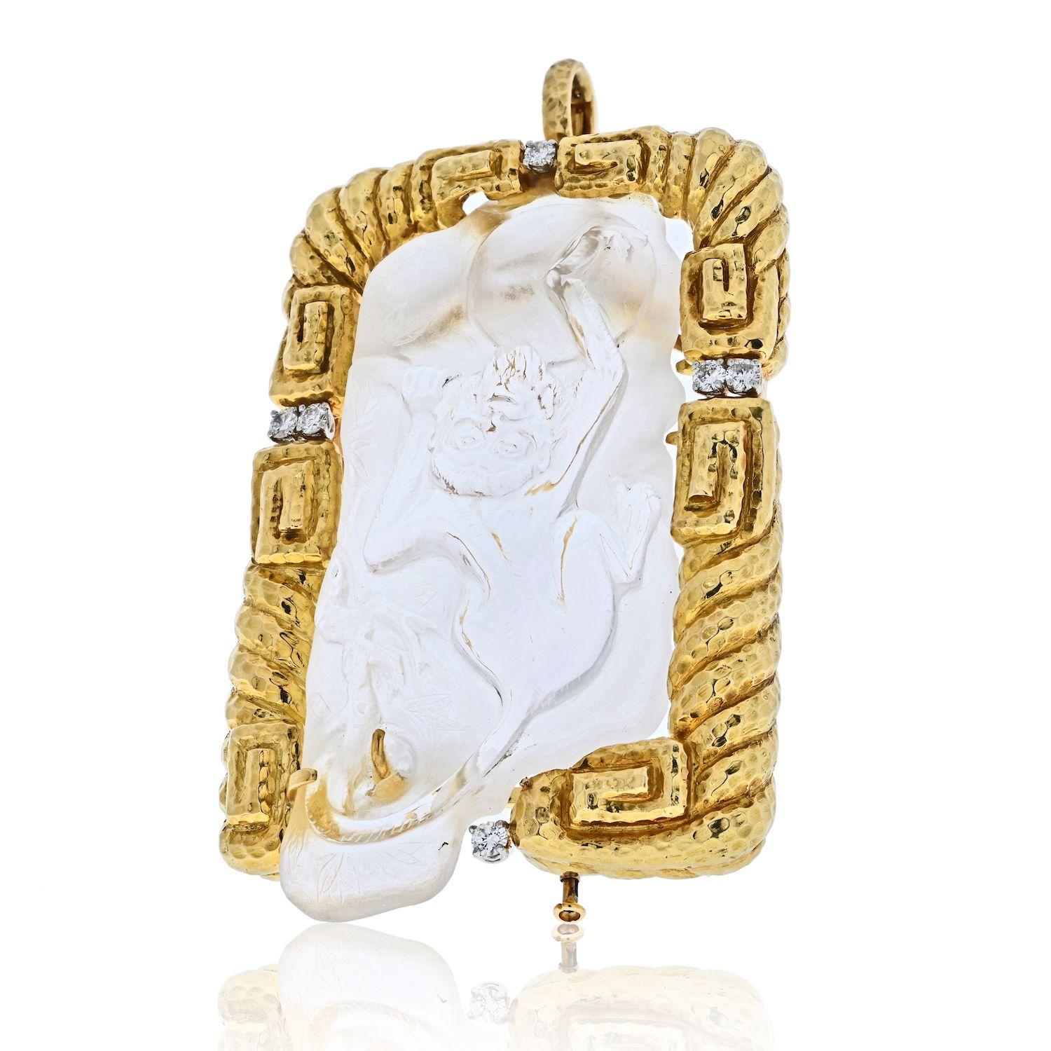 This is a striking David Webb Rock Crystal, Diamond, and Monkey Gold Pendant that can double as a Brooch.
Rock crystal rectangular carving of a monkey.
Round brilliant-cut diamonds, total weight approximately 0.80 cts. 
18K yellow gold, pendant