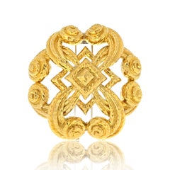 David Webb Broche martelée à volutes en or jaune 18 carats