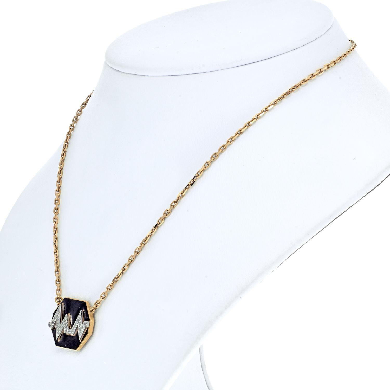 Current model from David Webb this is one trendy pendant: David Webb 18K Yellow Gold 