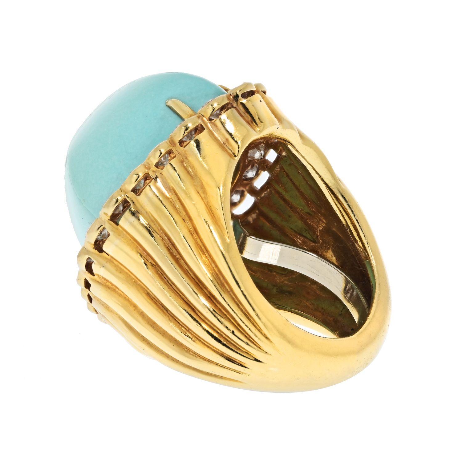 The vintage David Webb platinum and 18K yellow gold rhombus-shaped cabochon turquoise ring is a true masterpiece that encapsulates the essence of timeless design. Created in the 1980s, this ring showcases exceptional craftsmanship and a unique blend