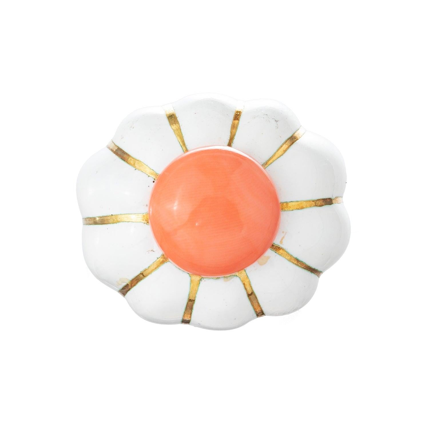 David Webb domed cocktail ring in 18k yellow gold decorated with white enamel panels and centering a button-shaped natural coral.  Coral measuring 13.55mm in diameter.  Signed '© WEBB 18k'.  Size 6.5.