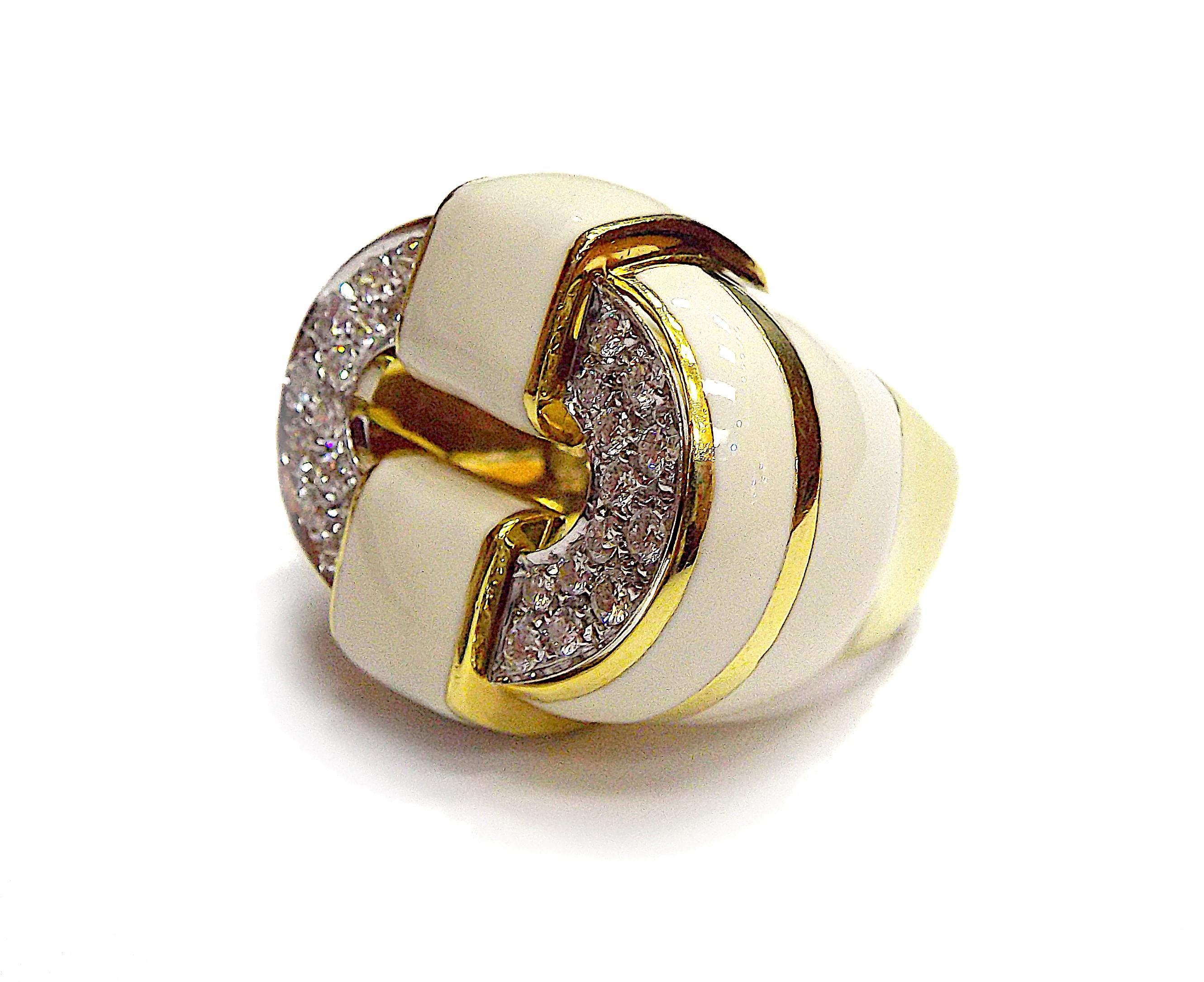 A stylish ring by David Webb performed in 18K yellow gold and white enamel, featuring approx. 1.56ct of diamonds. The ring size is 6.75, weight is 23.8 grams, top dimensions are 2.3cm x 2.8cm. Signed Webb, marked 18K.