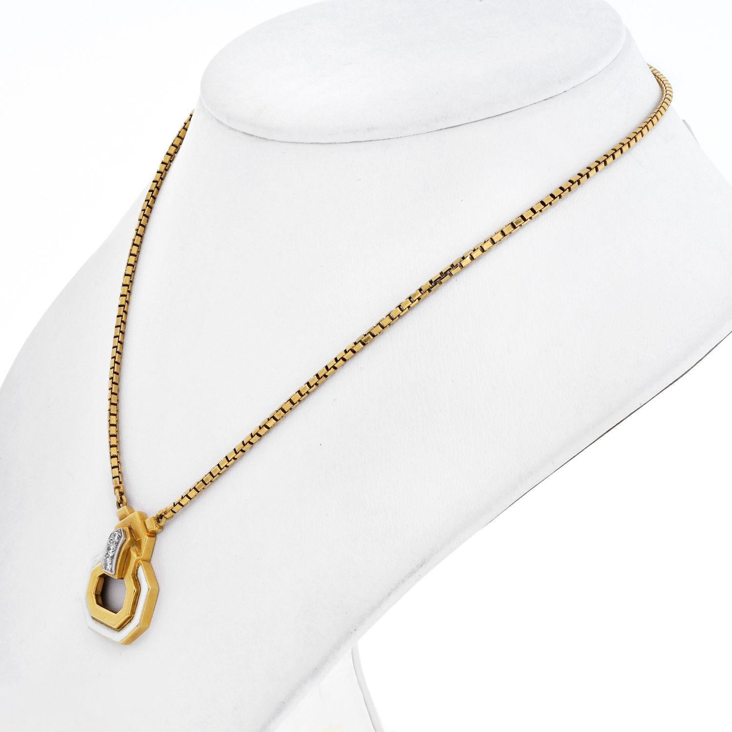 Lovely 18k yellow gold pendant with signature white enameling and a touch of diamonds by David Webb. Box chain width 2mm. Chain length 15 inches. 
Length: 25mm
Width: 20mm