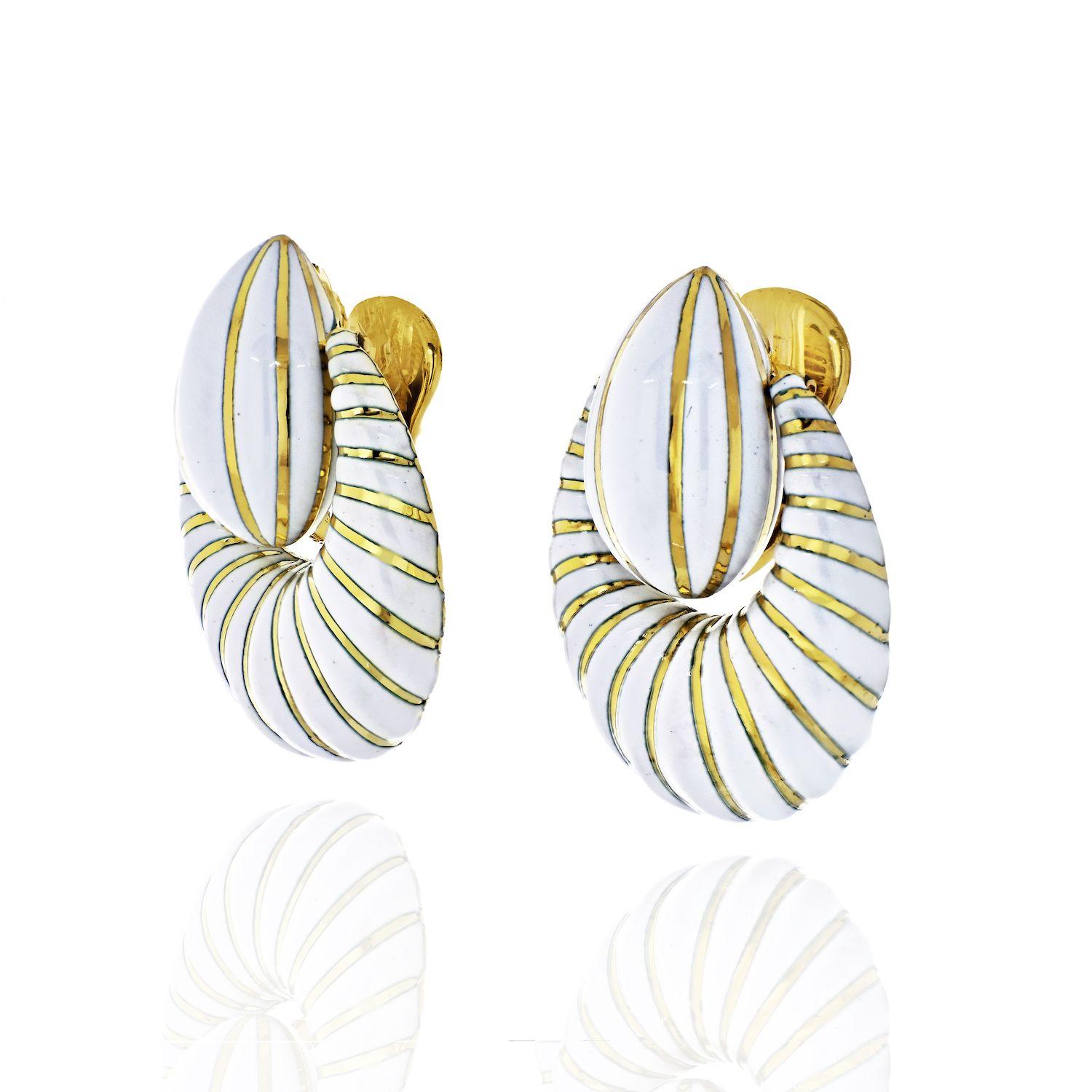 Gone are the days when white enamel earrings were considered summer jewelry. If you are like us you would want to wear these door knockers all year around. Imagine yourself wearing these with an oversized white cardigan as well as the oversized
