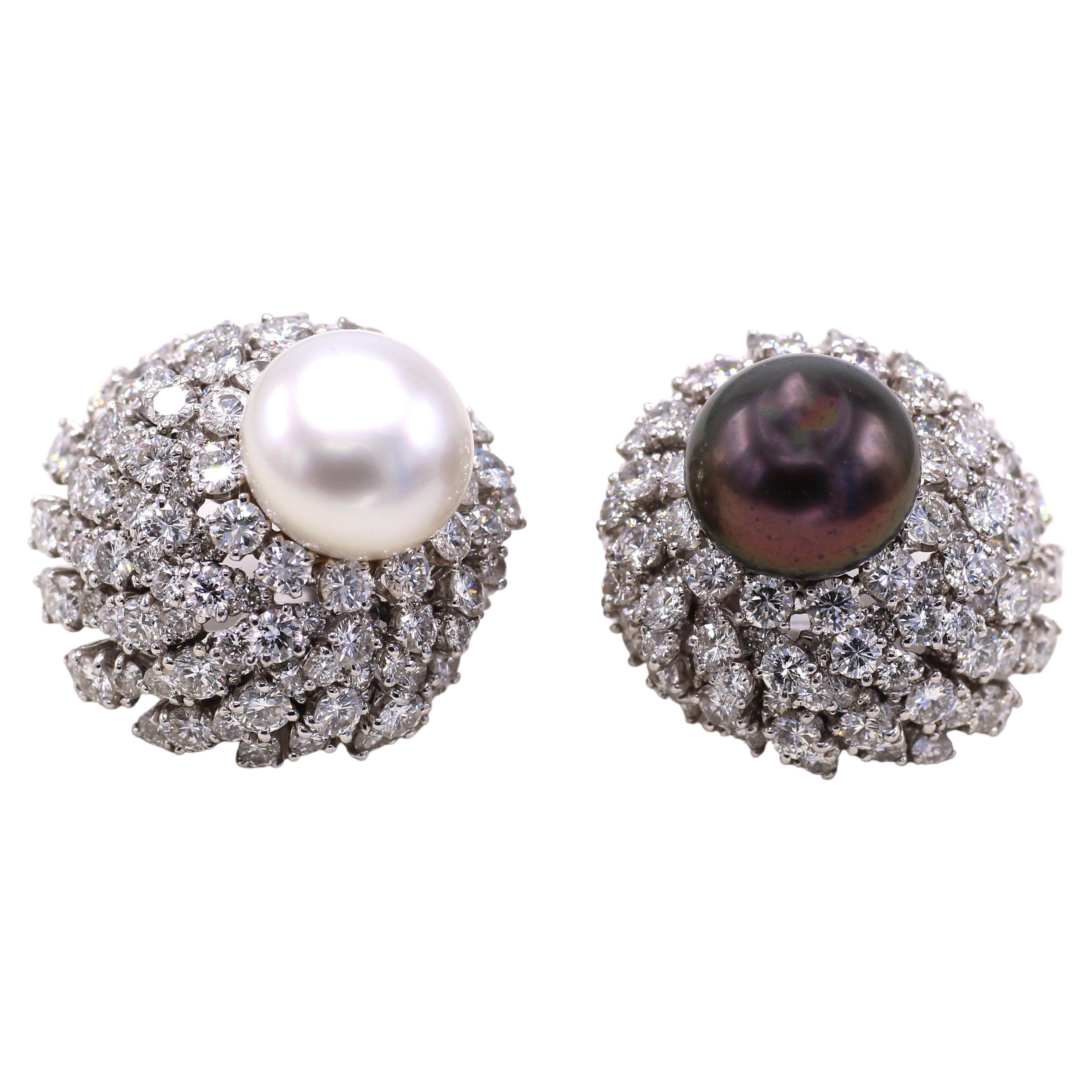Stunning one of a kind 1960s ear clips by David Webb. Beautifully designed and amazingly handcrafted in platinum, these bold earrings in a bombe design are set with layers of perfectly matched white bright and sparkly round brilliant cut diamonds.