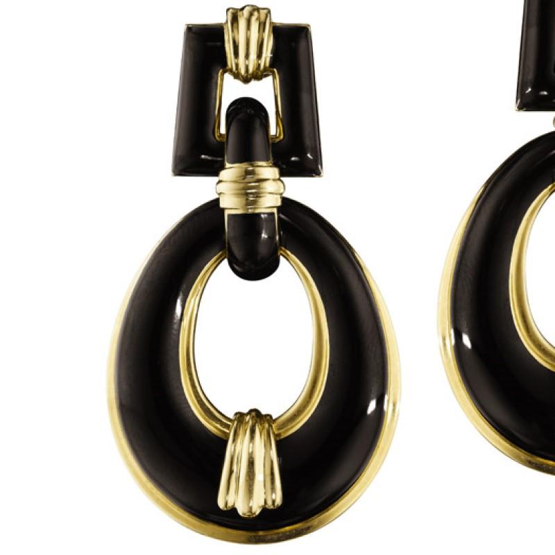 A pair of American Mid-20th Century enamel and 18 karat gold earrings by David Webb. The earrings are designed in an articulated 'door knocker' motif. The open oval drops are suspended from rectangular shape gold and enamel tops.   Circa: