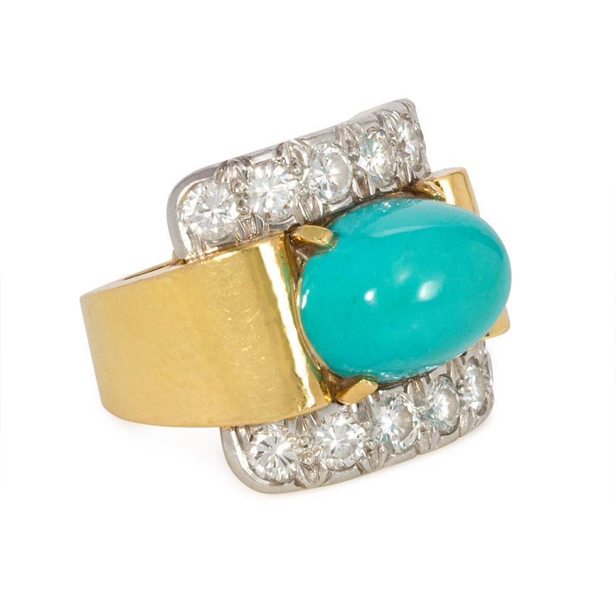 A gold, diamond, and turquoise cocktail ring featuring a horizontally set turquoise in a diamond plaque setting bisected by a gold band, in 18k and platinum.  David Webb.  Atw 1.80 ct. diamonds

Current ring size: US 6 (Please contact us with