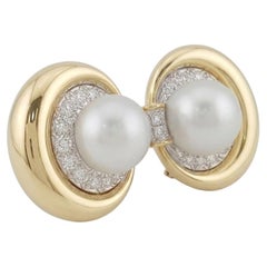 Boucles d'oreilles à clip David Webb en or jaune 18 carats, ornées d'un diamant rond taille brillant de 2 carats et d'une perle