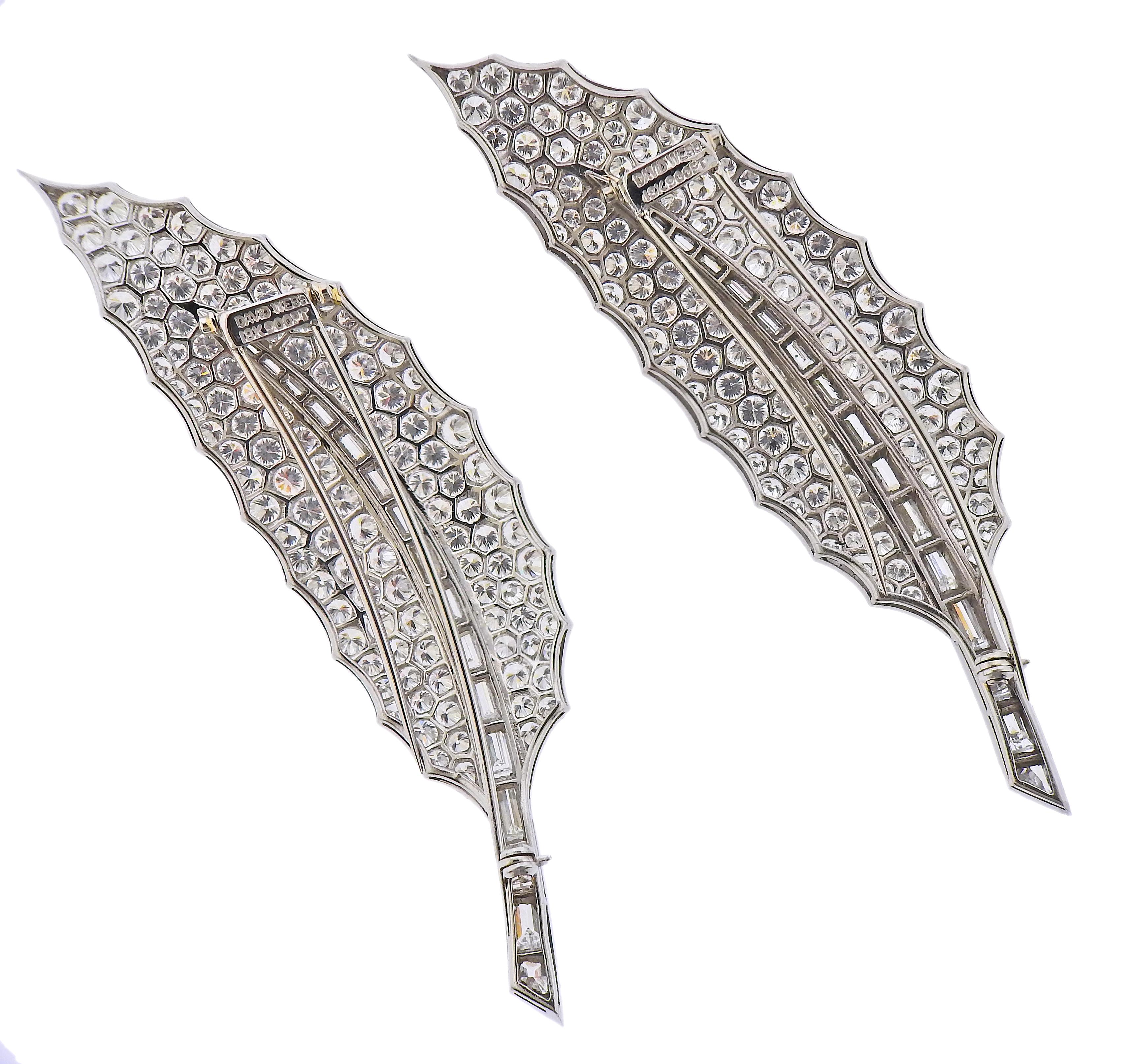 Pair of impressive platinum and 18k gold leaf brooches by David Webb, with a total of approximately 40 carats in round and baguette cut H/VS-SI1 diamonds. Each brooch measures 3 5/8