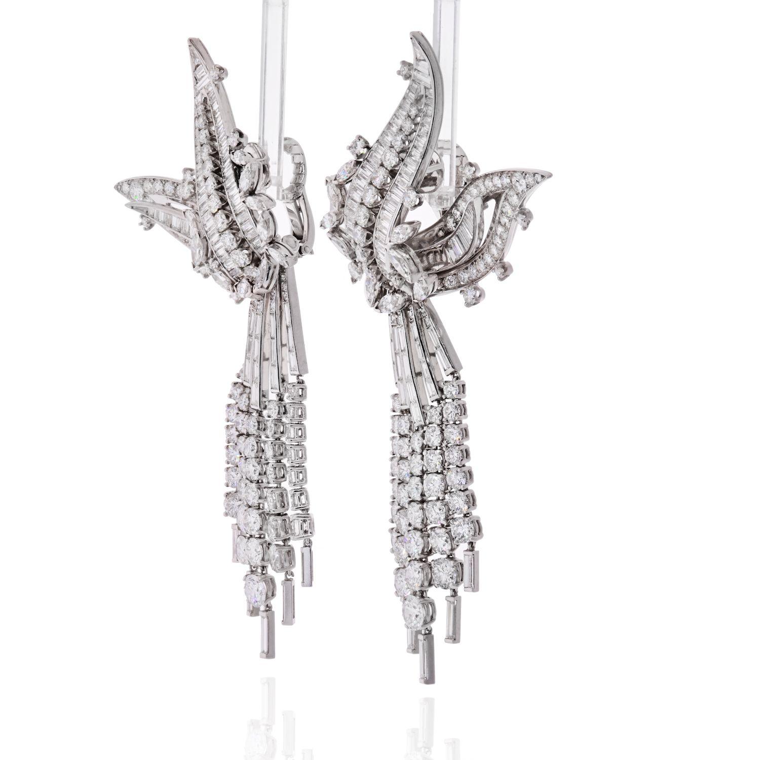 For your best jewelry moment! These are celebrity and red carpet Day & Night diamond earrings by David Webb!
Crafted in Platinum and white gold these are truly a superb work of art. Absolutely magnificent on the ear with shimmering 50 carat of
