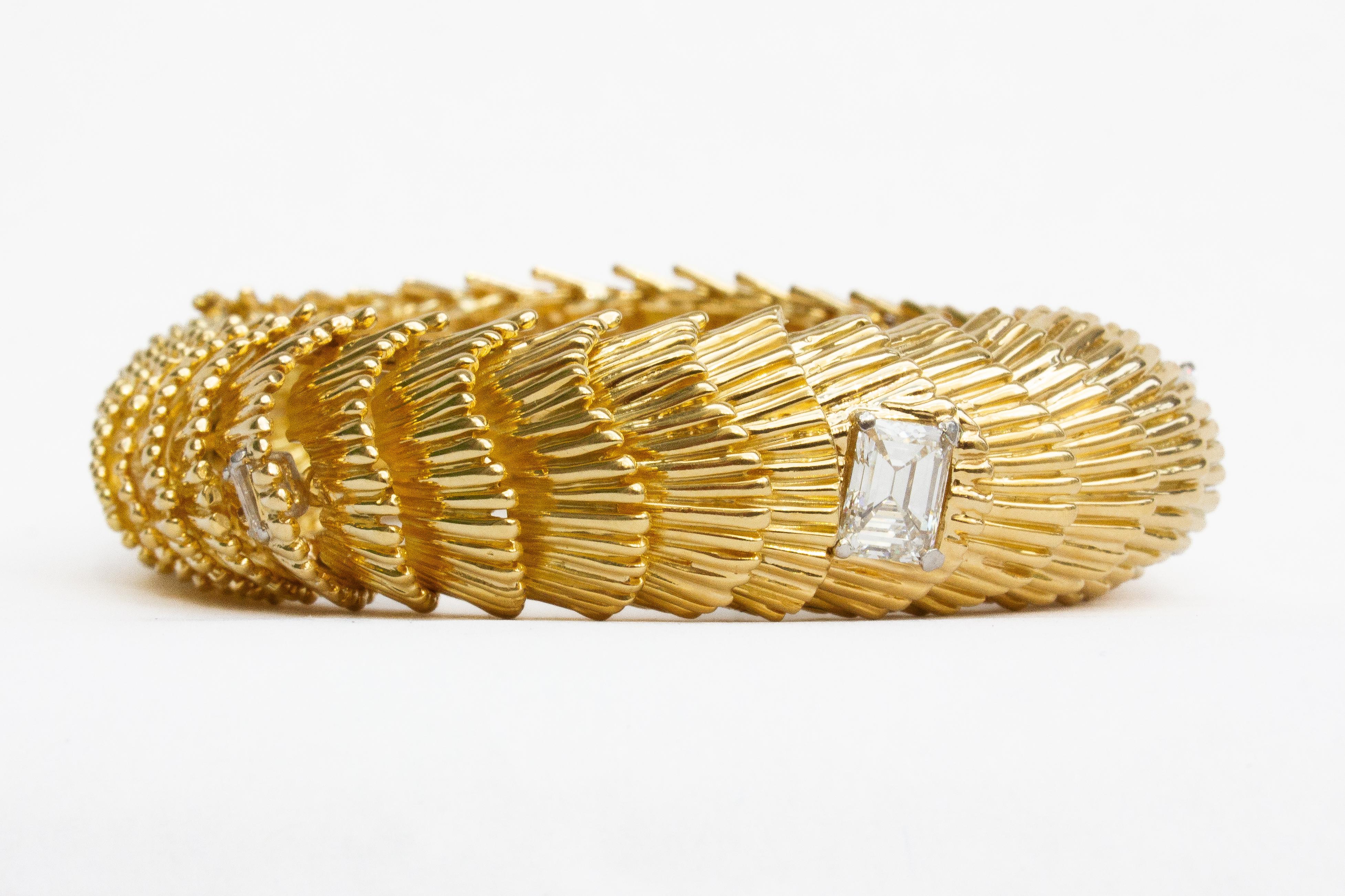 Experience the timeless elegance of this signed vintage David Webb 18K Yellow Gold and Diamond Bracelet, proudly presented by J. Birnbach. A true collector's piece, this bracelet exemplifies the exceptional craftsmanship and iconic design for which