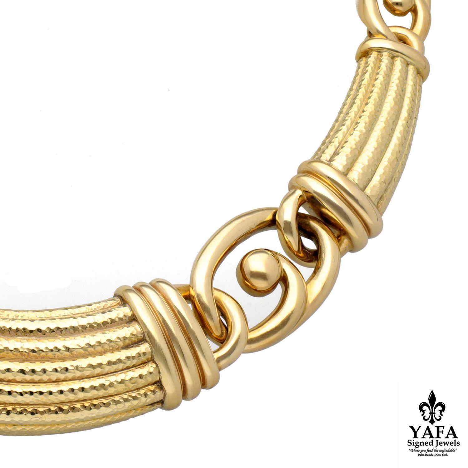 Crafted with Artistry and Passion the 18K Yellow Gold Design is Focused Around Three Scroll Reeded Accent Links of Hammered Gold.

Collection - Ancient World
Circa - 1990's
Signed - Webb