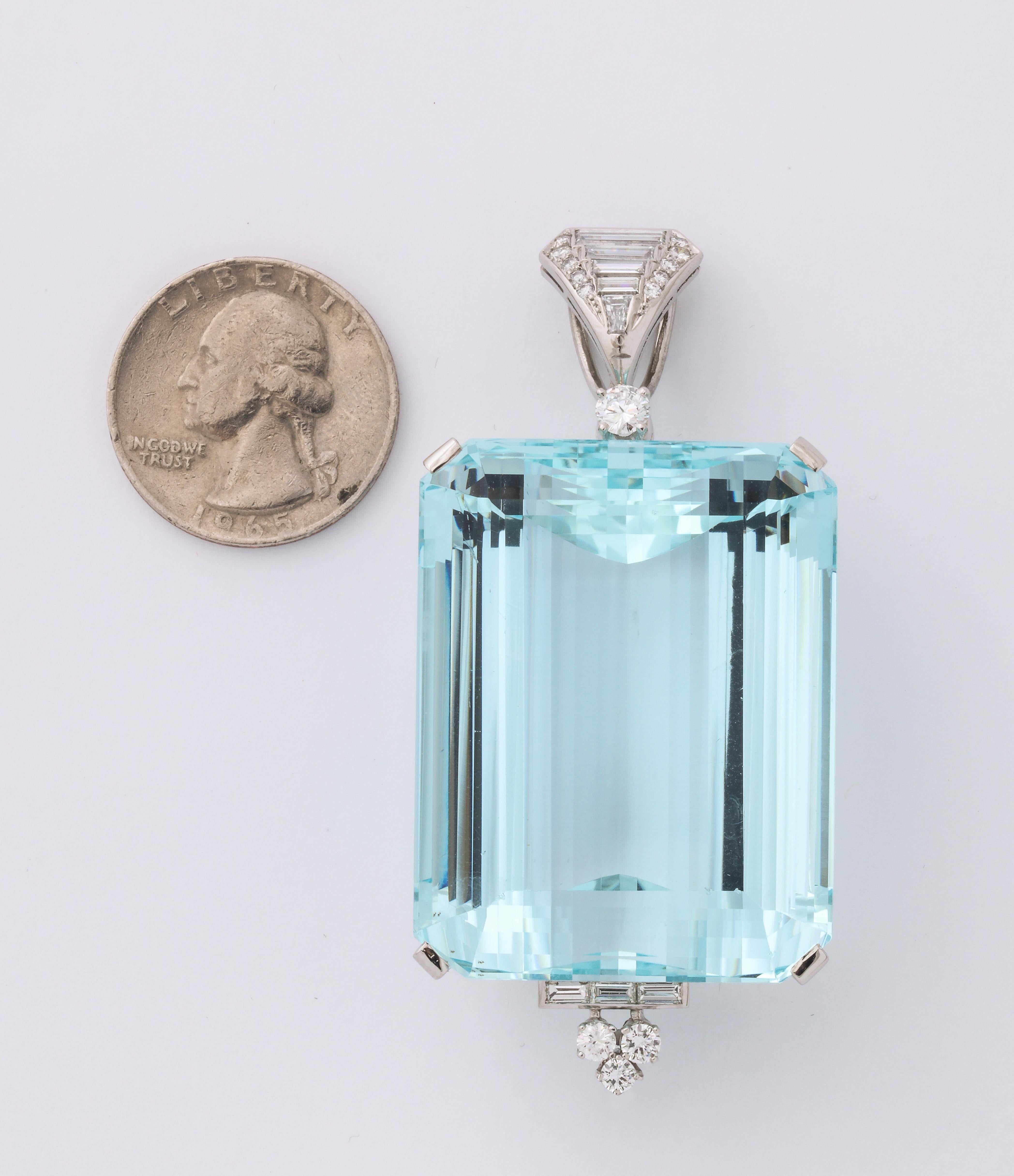 David Webb Aquamarine Diamond Platinum Pendant. 250 carat emerald cut aquamarine, 14 full cut diamonds approximately .65 carats, 7 baguettes approximately .75 carats. Marked A 7 900 Pt David Webb. AGL report  1096157 states stone is unenhanced. 3