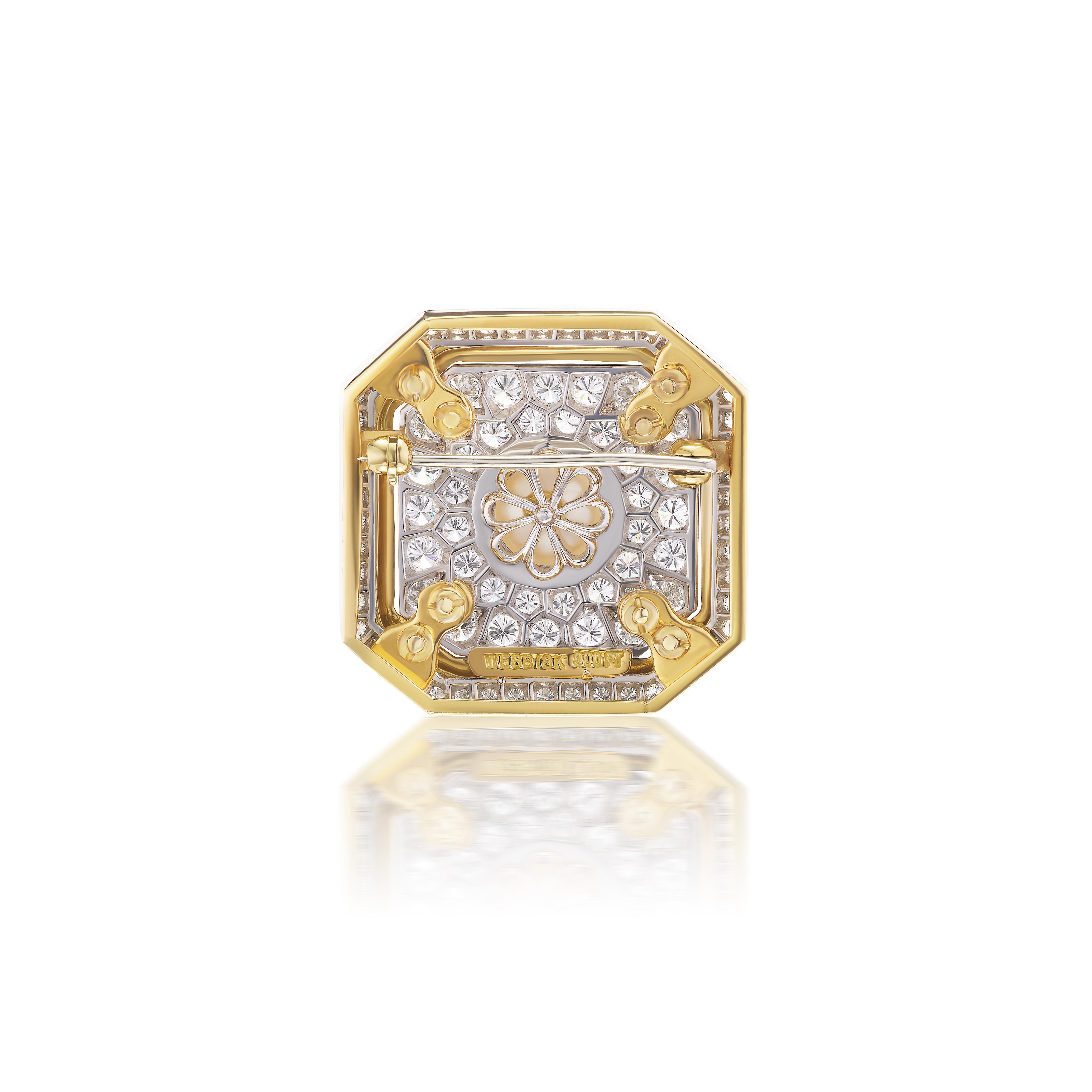 This Art Deco design brooch features and impressive cultured pearl (13.53mm diameter) of superb quality and condition. It is enhanced by 84 round brilliant diamonds weighing approximately 6.84 carats and a black enamel frame mounted in platinum and
