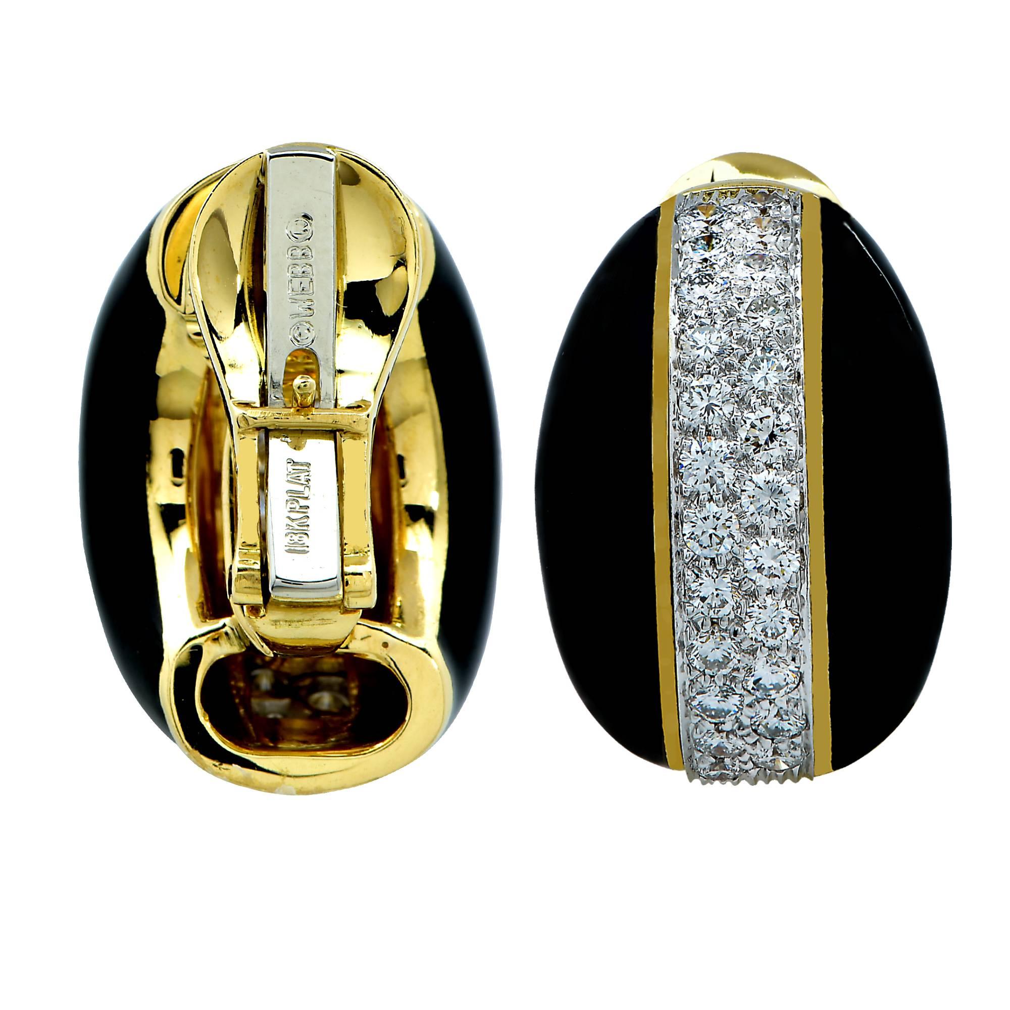 18K yellow gold David Webb earrings containing approximately 2.50cts of round brilliant cut diamonds, F color and VS clarity. These spectacular earrings are accented by black enamel. 

Our pieces are all accompanied by an appraisal performed by one