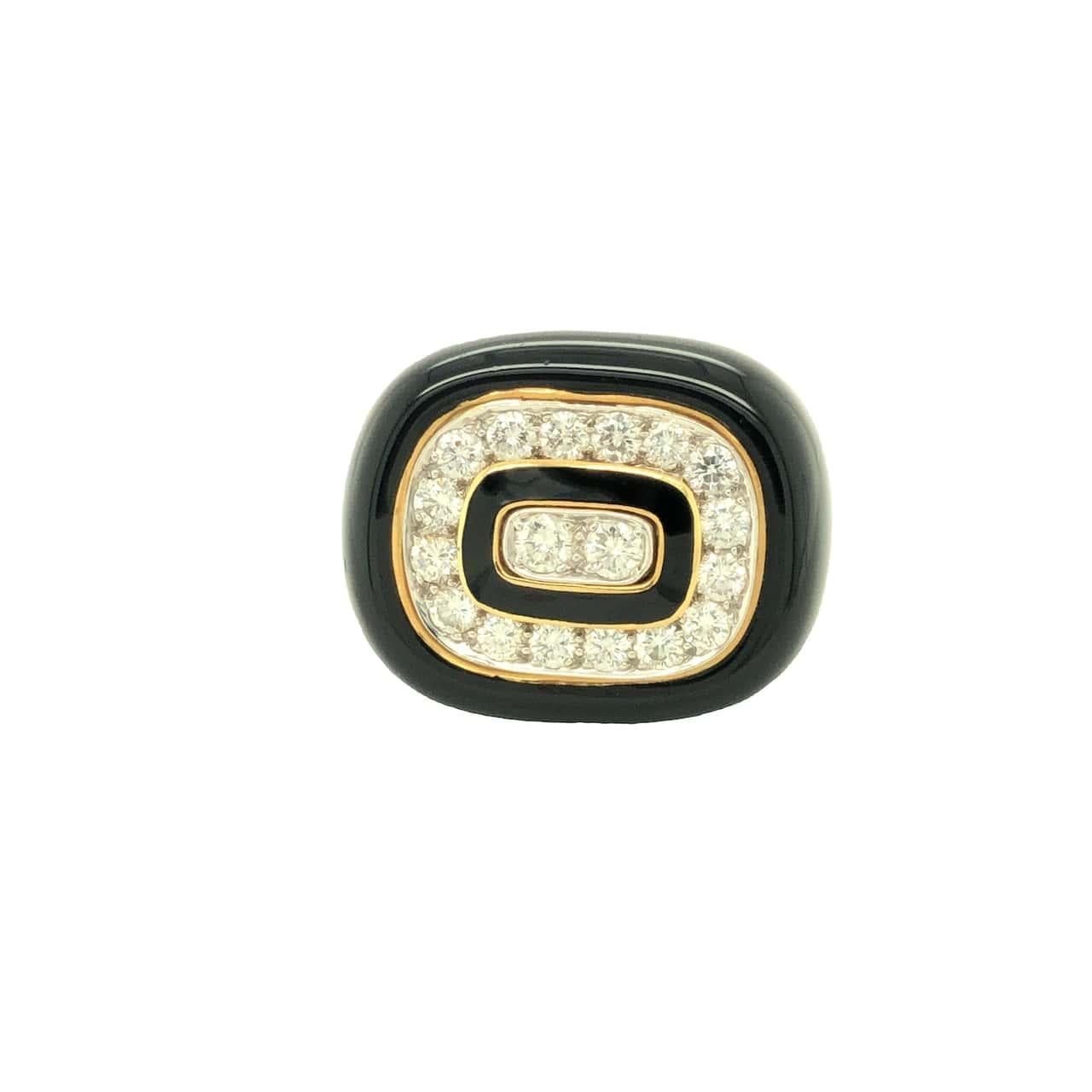 An extraordinary discovery from our estate collection, this remarkable black enamel and diamond ring has been meticulously crafted in 18K yellow gold by Tiffany & Co. The ring's top section spans a generous 7/8 inch by 1 inch and is sized between