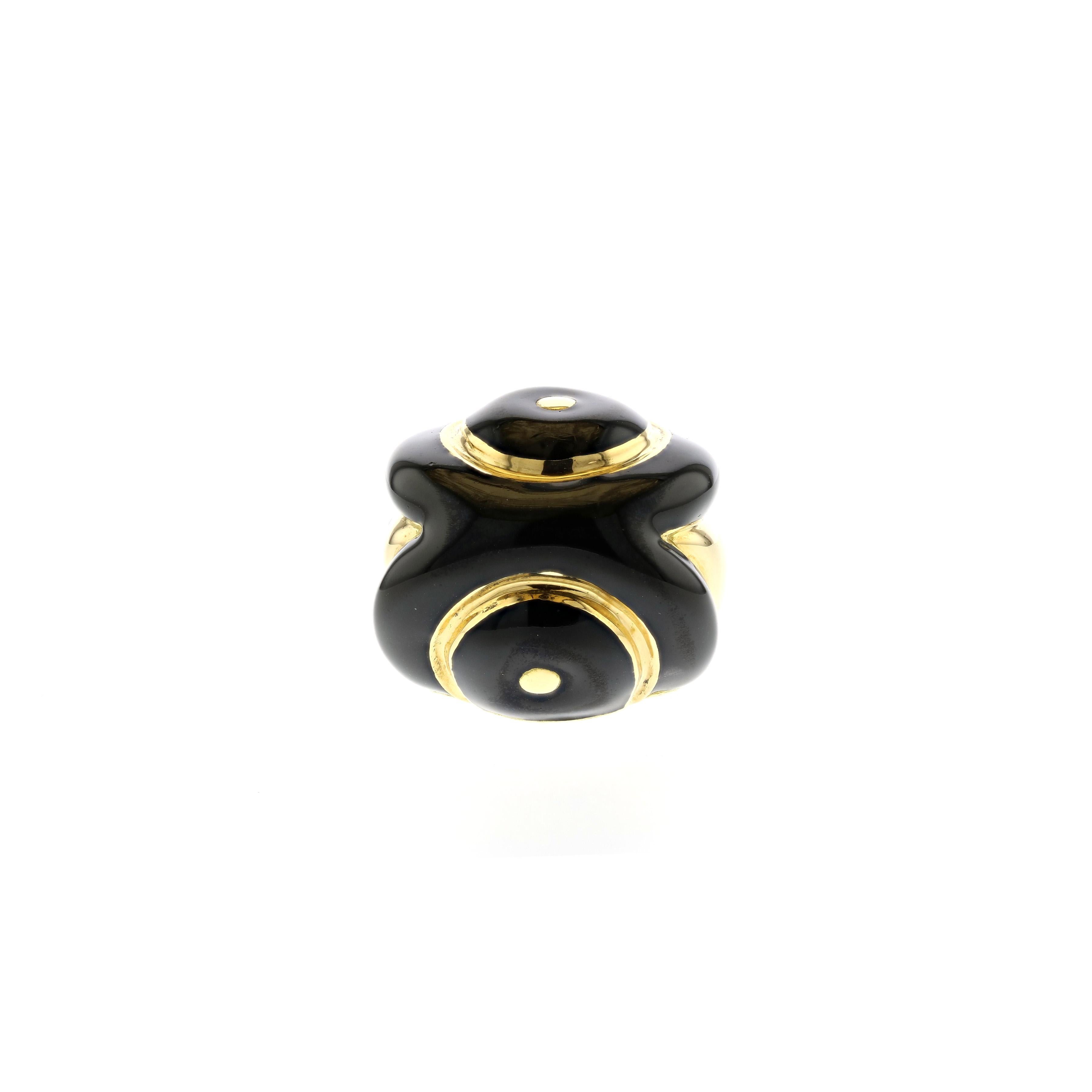 David Webb ring in 18K yellow gold with black enamel.  The ring is a size 6 1/2 and it does have a butterfly insert.  Measures 15/16 inches by 15/16 inches and stands 5/8 inches off the finger.  Stamped with serial number BS489.  