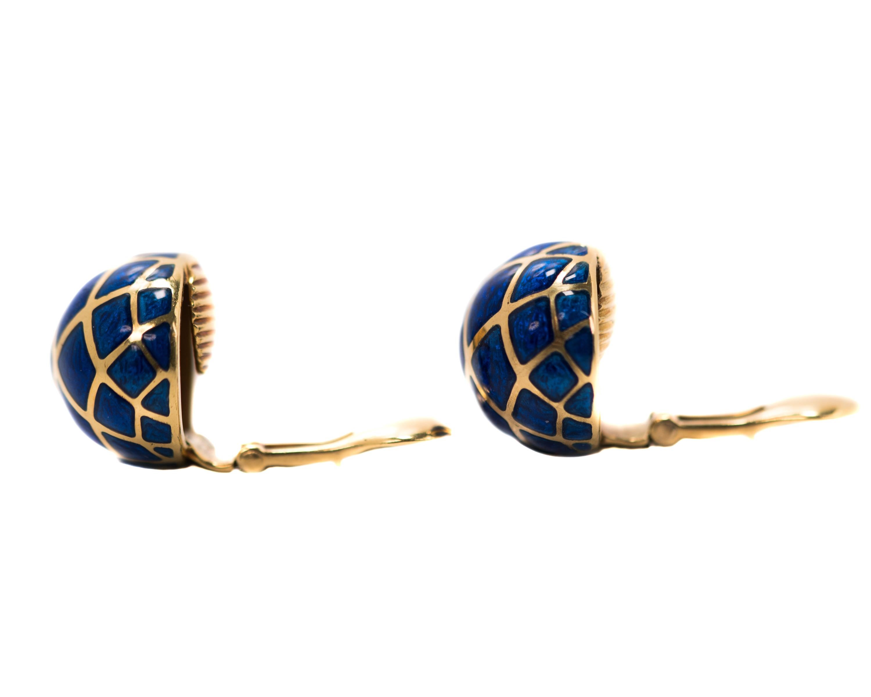 1990s David Webb Round Enamel Clip On Earrings - 18 Karat Yellow Gold, White Gold, Blue Enamel

Features:
Rounded half-sphere front
Cobalt Blue Enamel
18 Karat Yellow Gold Diamond Overlay Pattern
18 Karat Yellow Gold Backs
Textured, convex disc on