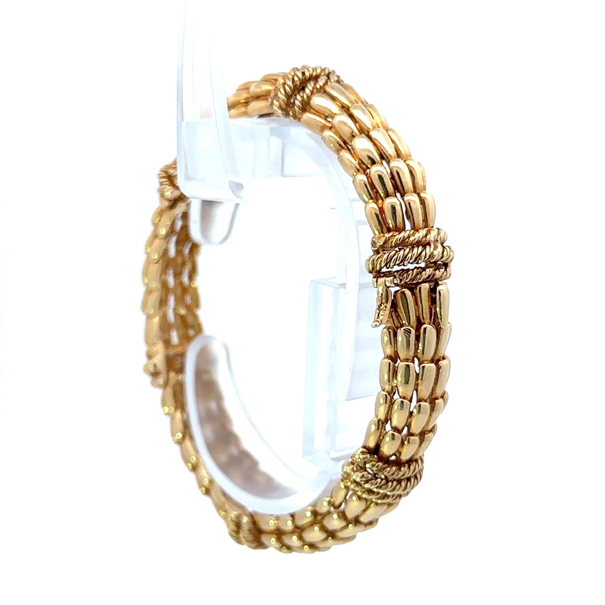 Magnificent 1970’S, 18K Yellow Gold David Webb “FISHSCALE” bracelet. This is composed beautifully with braided detailing and unique rope work - hand crafted to perfection. This is a gorgeous dimensional bracelet that will always a remain a timeless,