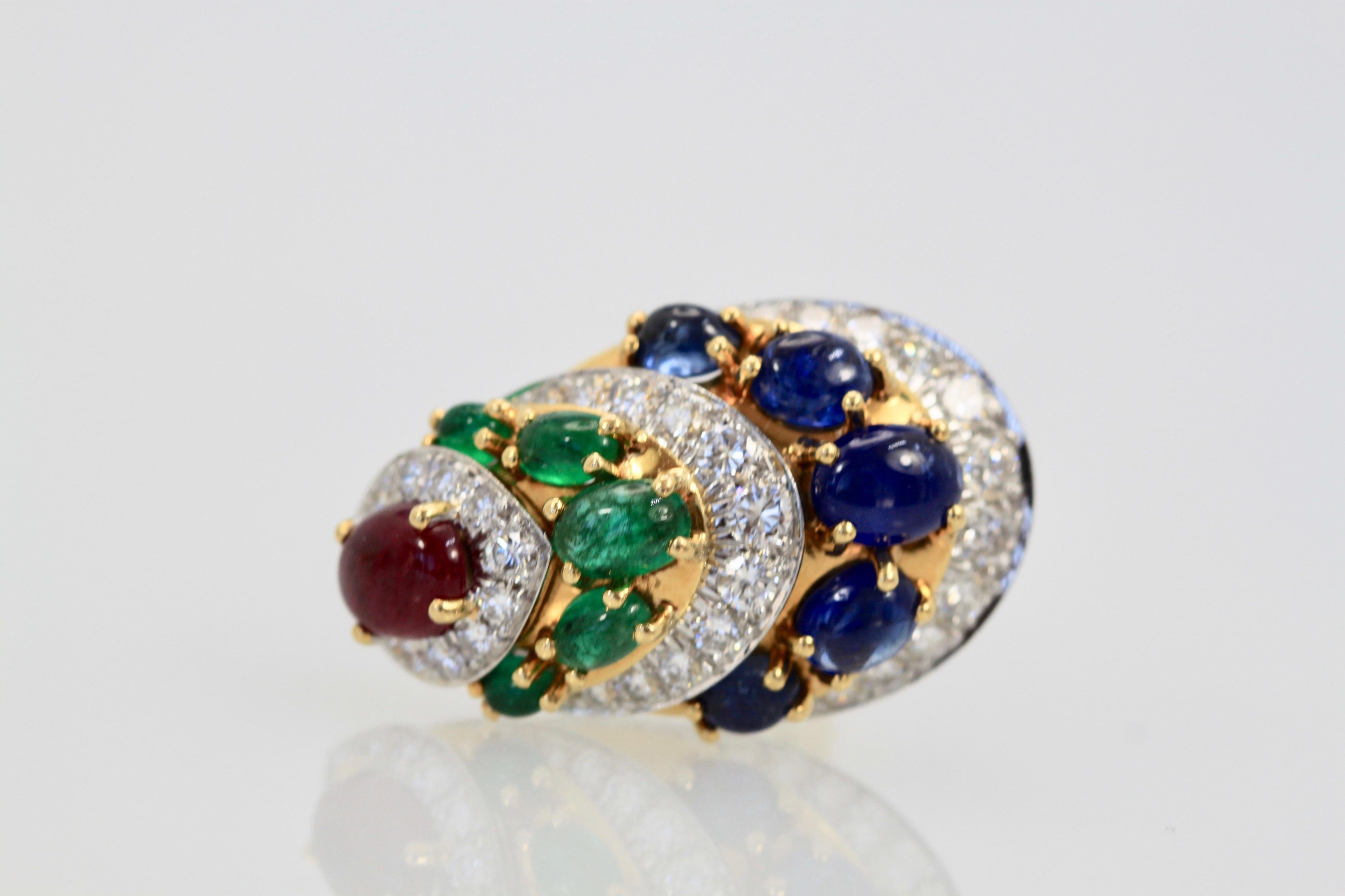 These David Webb Sapphire, Emerald, Ruby, Diamond earrings are stunning.  They are 3cm x 1.5cm and holds 5 Sapphires, 5 Emeralds, 5 Rubies and covered in Diamonds.  18K Yellow Gold the gemstones weigh approximately 5 carats with 2 carats of