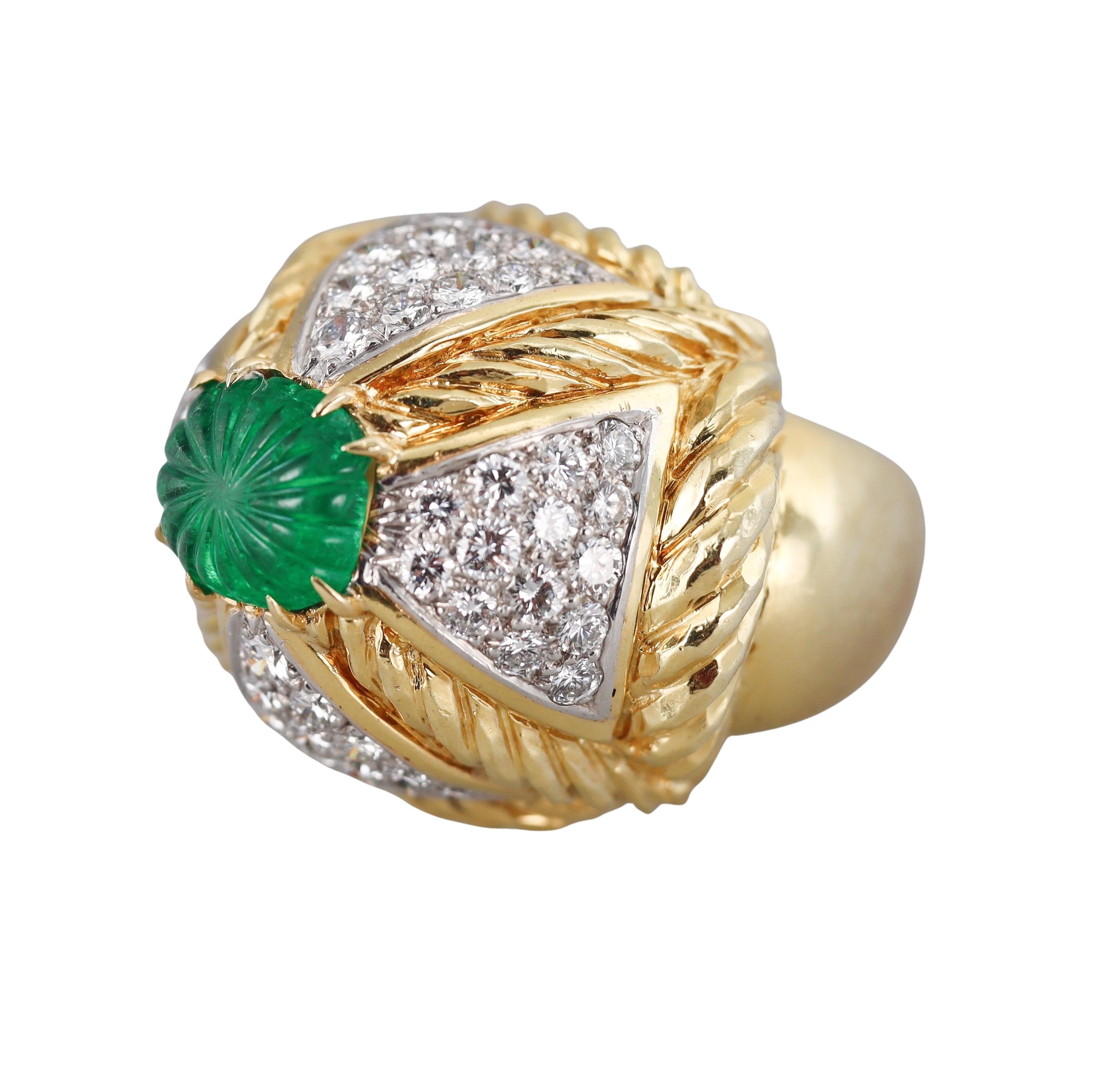 1970s David Webb ring set in platinum and 18k yellow gold, center carved emerald - measures approx. 8.3 x9.52mm,  surrounded with approx. 3.00ctw SI1/GH diamonds. Ring size 6, top of the ring is 23mm x 28mm, ring sits approx. 19mm from the top of