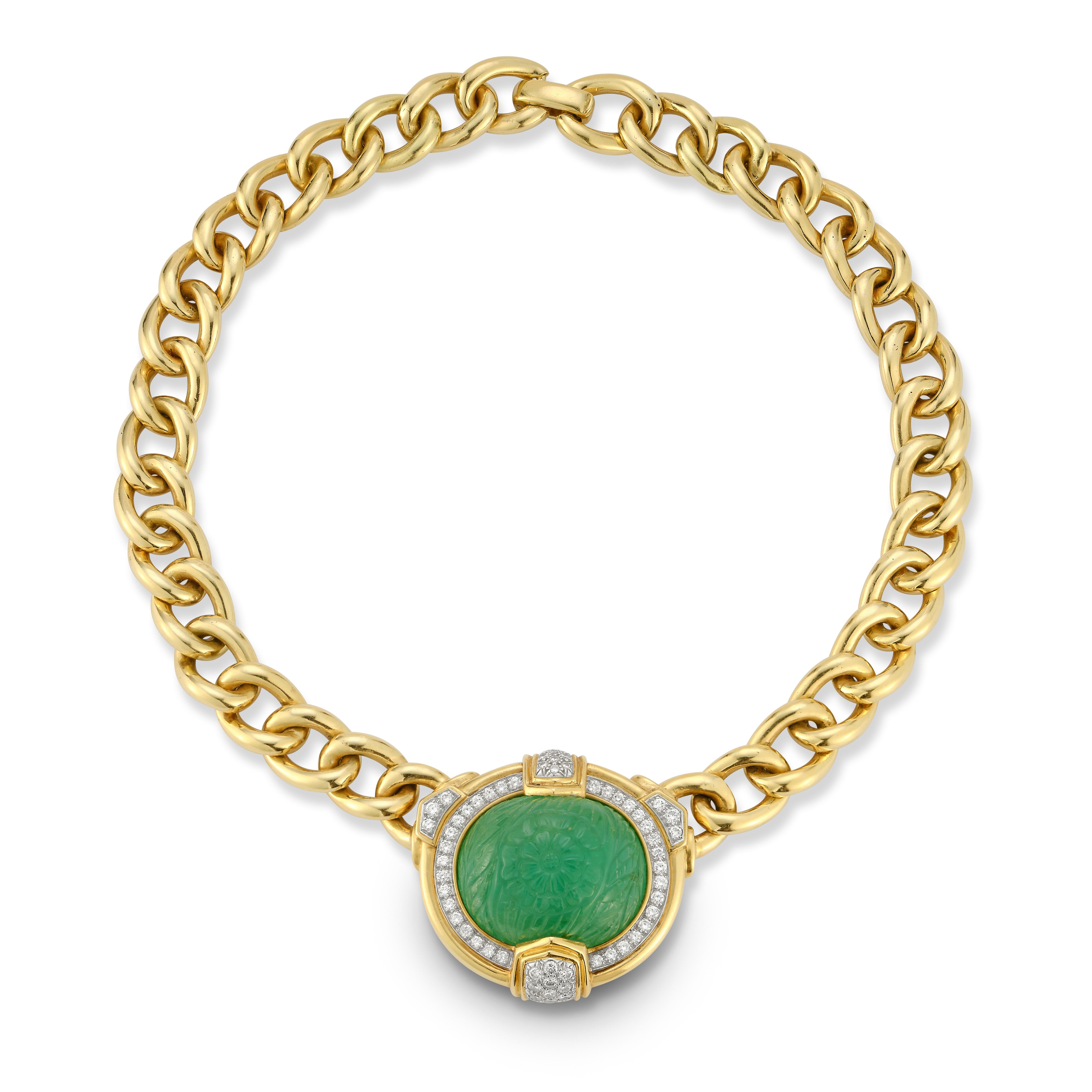 David Webb Carved Emerald Gold Link Necklace

A carved emerald set with round diamonds in a gold link chain.

Emerald measuring approximately 31.8 x 25.9 x 16.1mm

Diamonds weighing a total of approximately 2.50 carats

Length 16½ inches

Signed