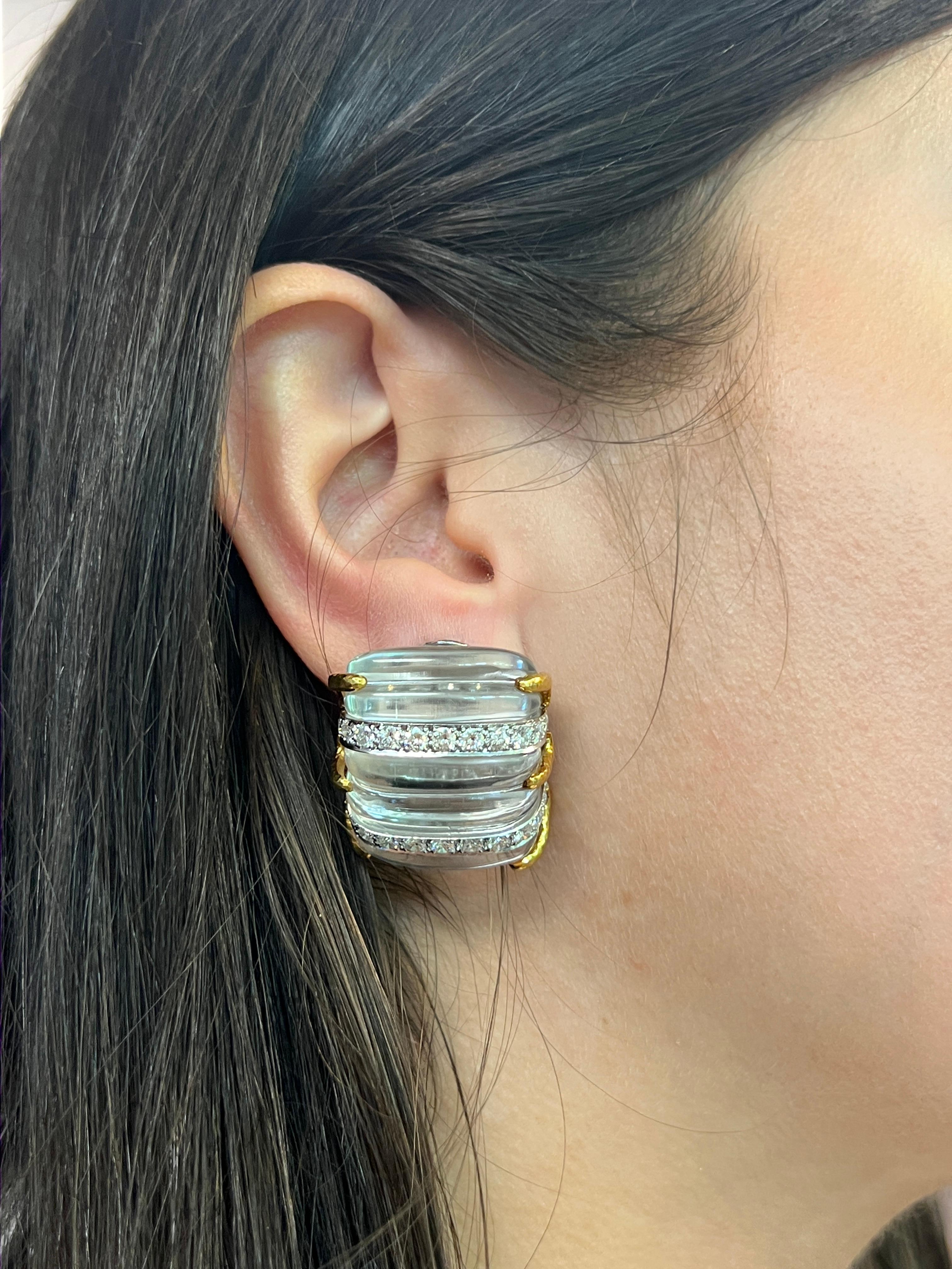David Webb Carved Rock Crystal and Diamond Earrings

 A pair of earrings by David Webb featuring carved rock crystal adorned with round cut diamonds. 

Approximate Diamond Weight: 3.60 carats 
Approximate Measurements: 1.15