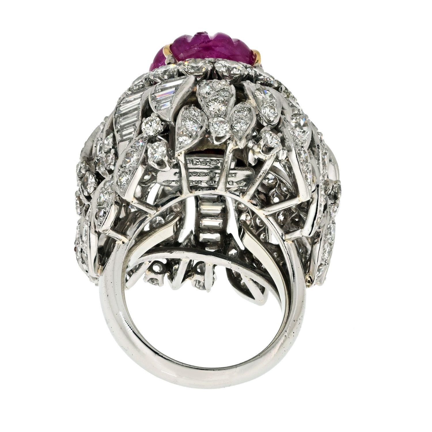 Unveil the allure of a true masterpiece with the Estate David Webb Platinum & 18K White Gold Carved Ruby and Diamond Bombe Cocktail Ring. With its captivating presence, this ring exemplifies the essence of opulence and artistry that David Webb is