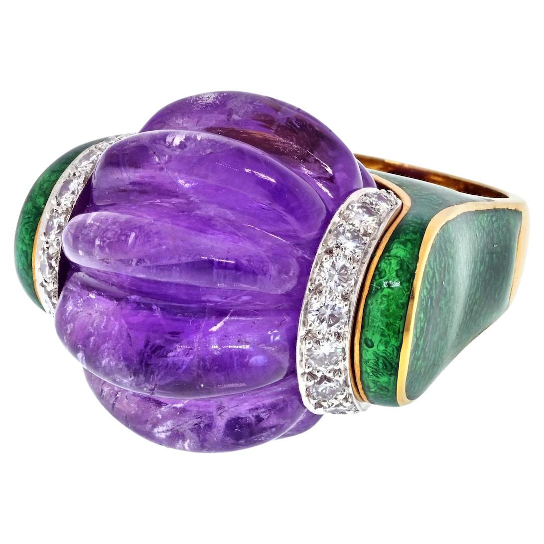 Since 1948, David Webb has carried forward a rich tradition of design,craftsmanship and creativity as an ICONIC American jewelry house. This is one of a few carved amethyst rings that were ever made by David Webb as a part of his amethyst and green