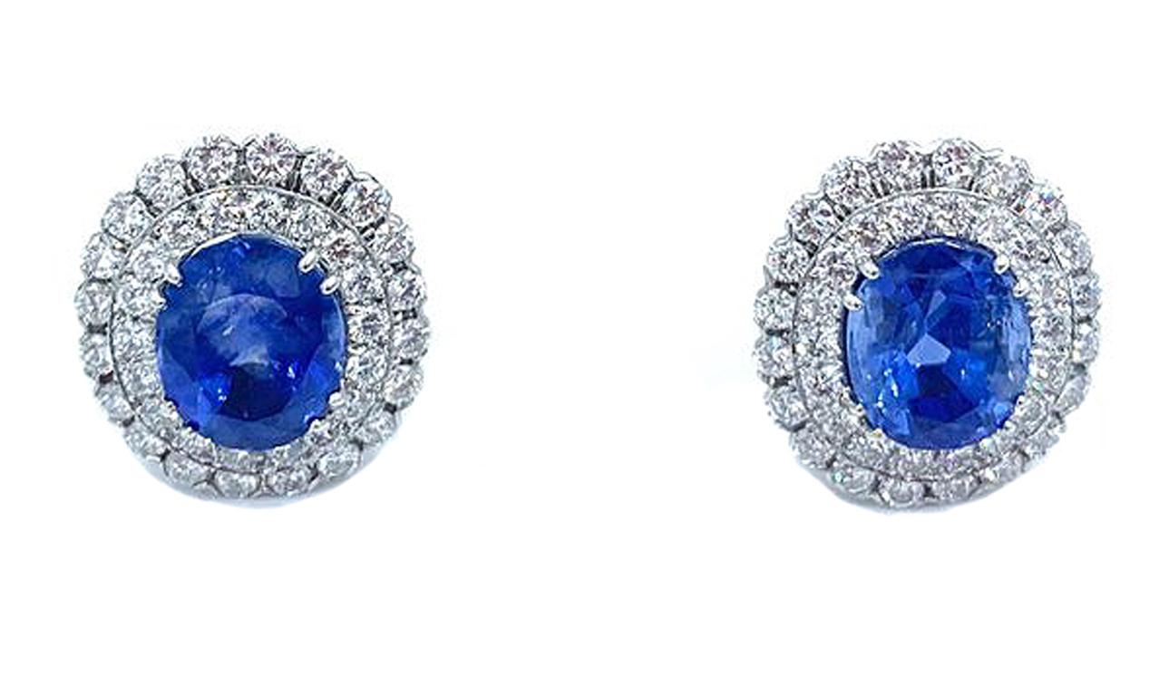 Pair of natural, no heat, untreated Ceylon blue Sapphires weighing 26.58 carats mounted in Platinum with over 4.5 carats of Diamonds, signed Webb with appropriate hallmarks. These impressive earrings are almost an inch wide and over an inch high!
