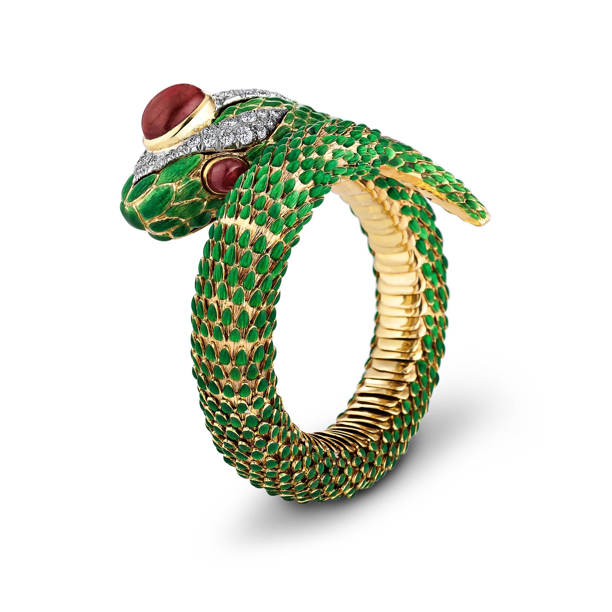 Serpents seasonally shed their skins symbolizing transformation, immortality, and the eternal renewal of life, and when wearing this extraordinary David Webb snake cuff bracelet you too will be ready for the next exciting chapter.  Handmade in the