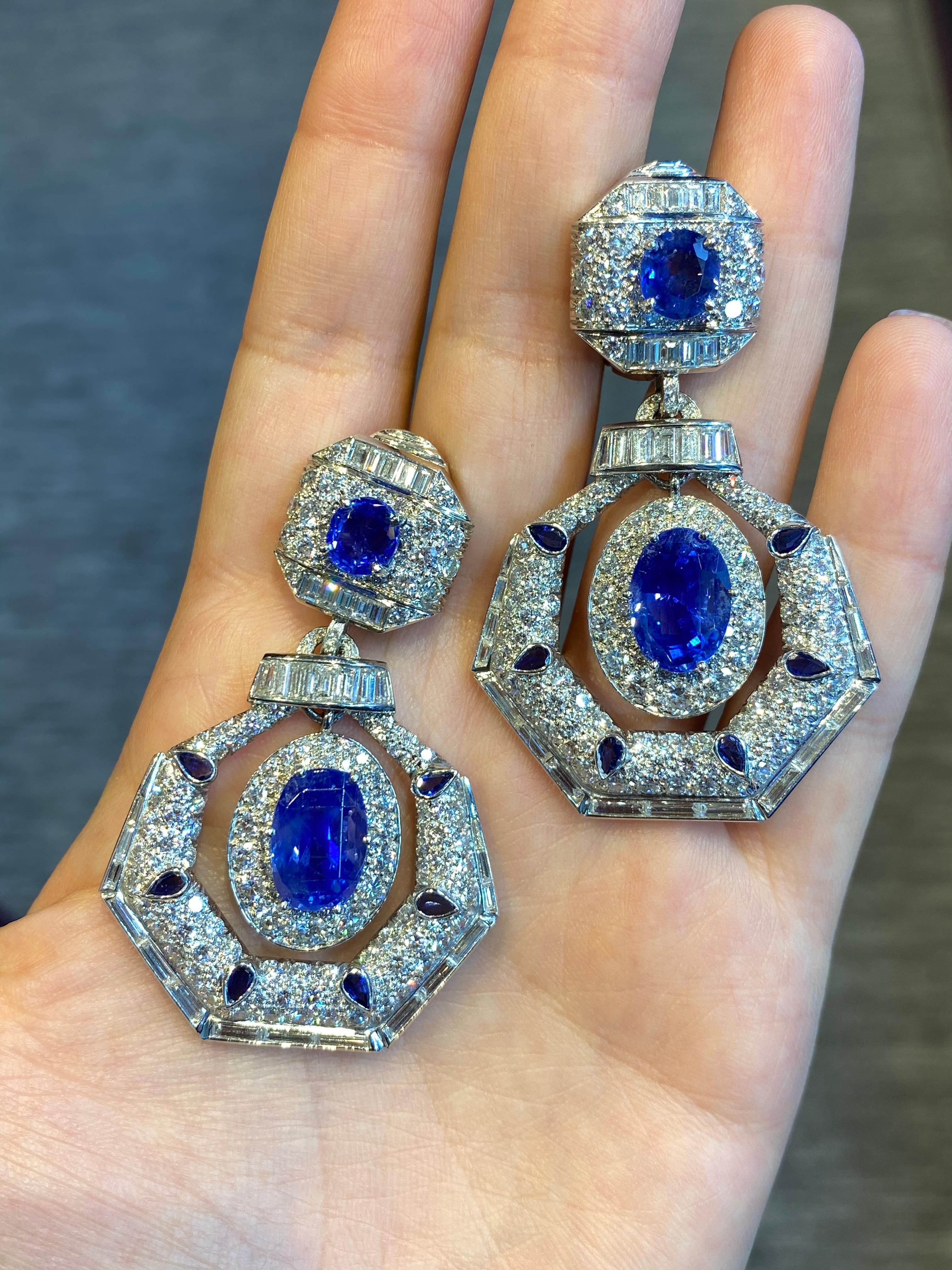 David Webb Ceylon Sapphire & Diamond Drop Earrings set in 18K White Gold & Platinum
Oval, round, and pear-shaped sapphires, round & baguette cut diamonds 
Back Type: Clip on
Length: 2