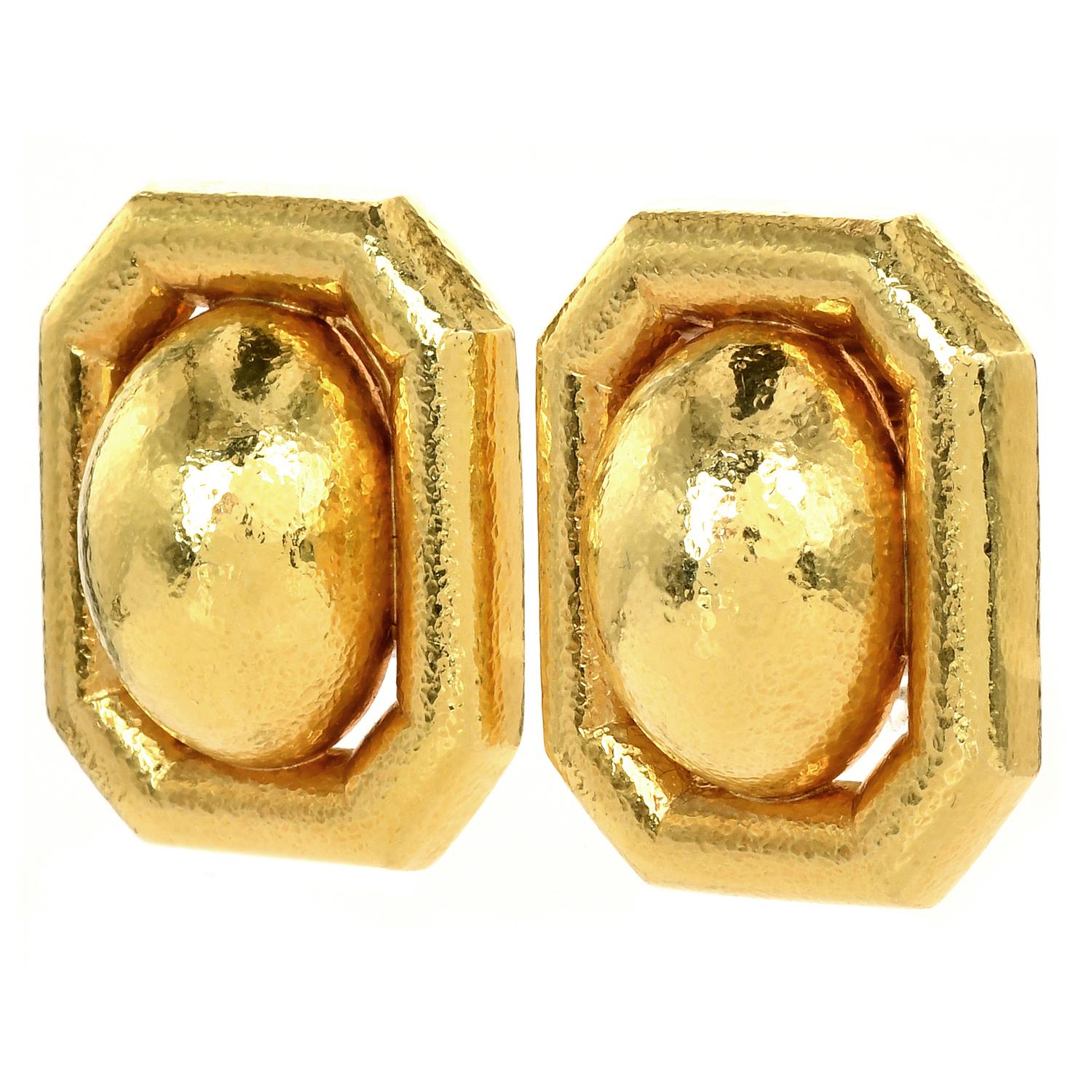 Stand Out with these Chic earrings, from New York's best David Webb,

Crafted in Solid 18K Yellow Gold, Hand Hammer the color is enhanced by a textured high Polish Finish. They measure approximately 32mm x25mm, are secured with clip-on backings for