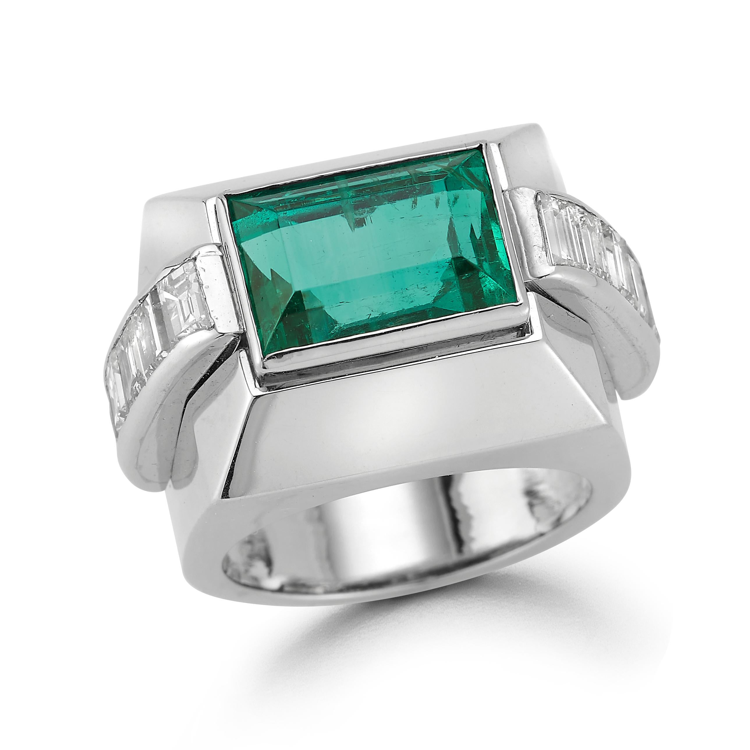 David Webb Colombian Emerald & Diamond Men's Ring

A platinum and 18 karat white gold ring set with an AGL certified Colombian step cut emerald and 12 baguette cut diamonds

Accompanied by a David Webb certificate of authenticity and an AGL